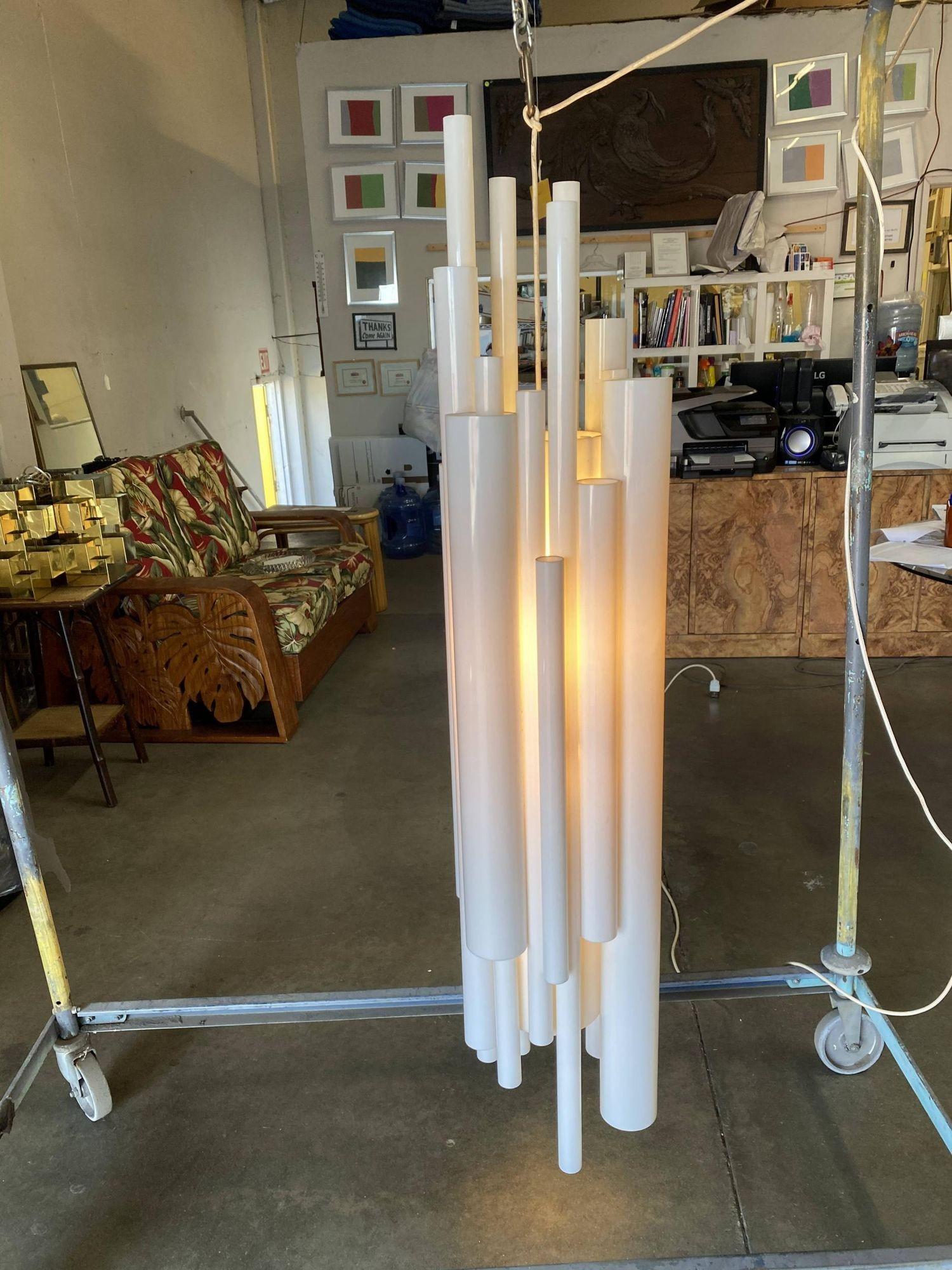 Acrylic Modernist White Lucite Stacked Tube Chandelier by Rougier, Circa 1970s For Sale