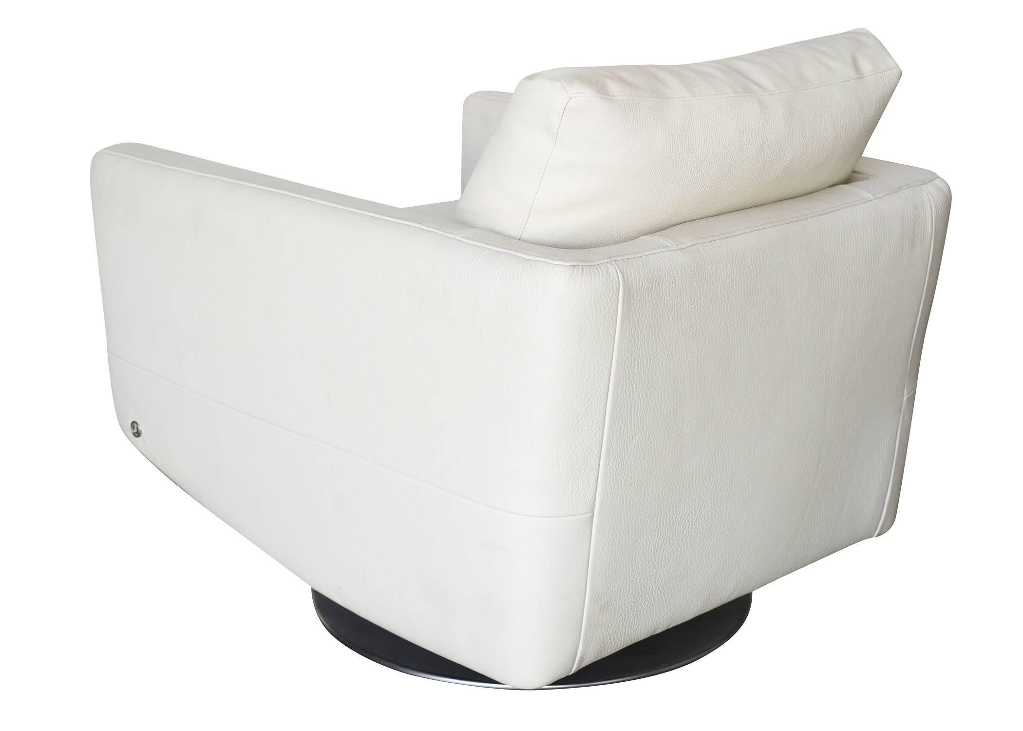 Modernist White Swivel Lounge Chair with Brush Steel Base For Sale at