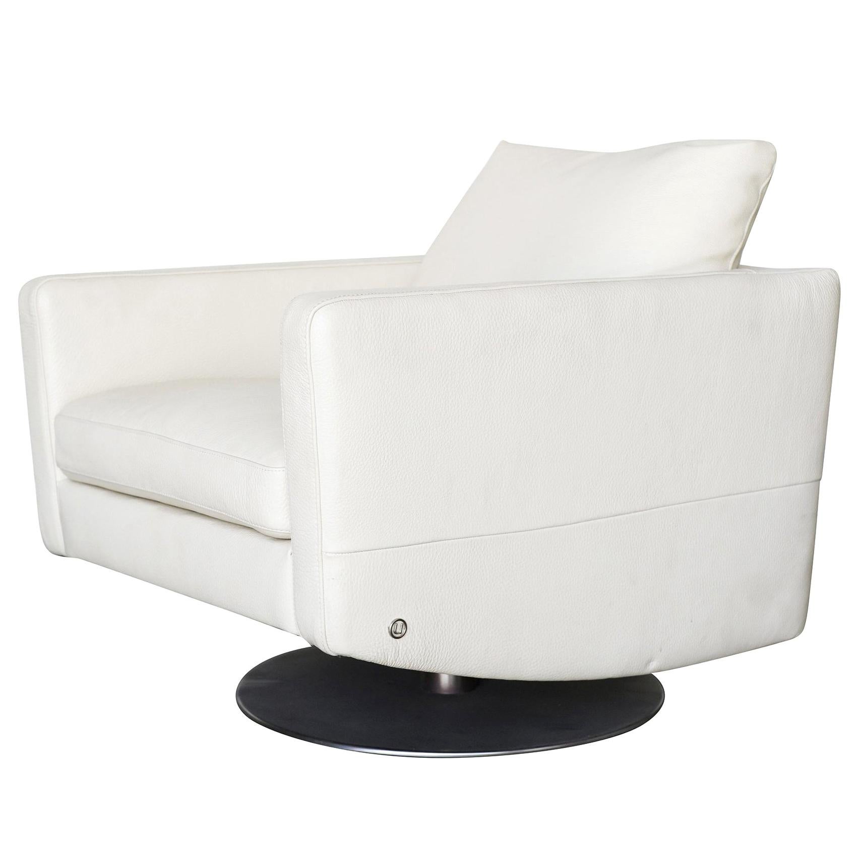 Modernist White Swivel Lounge Chair with Brush Steel Base For Sale