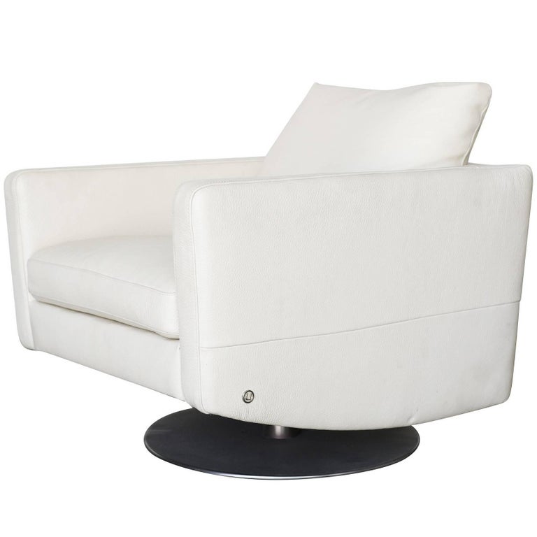 Modernist White Swivel Lounge Chair with Brush Steel Base For Sale at