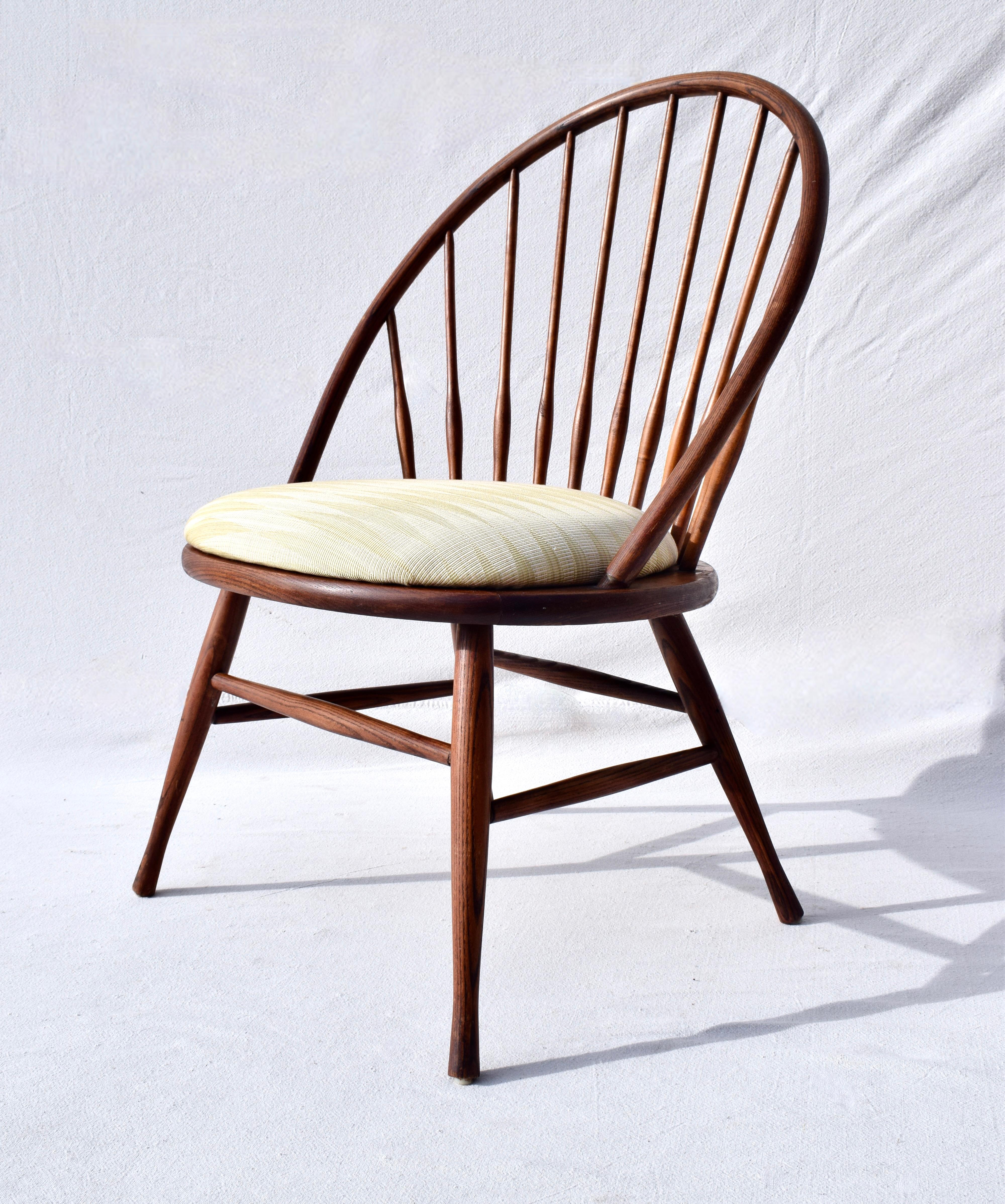 A modern interpretation of the Classic Windsor chair form, in solid Oak, made in Sweden. Very clean, original condition newly upholstered with proportions that work well in a variety of settings., ready to use. Attributed to Yngve Ekstrom, unsigned.