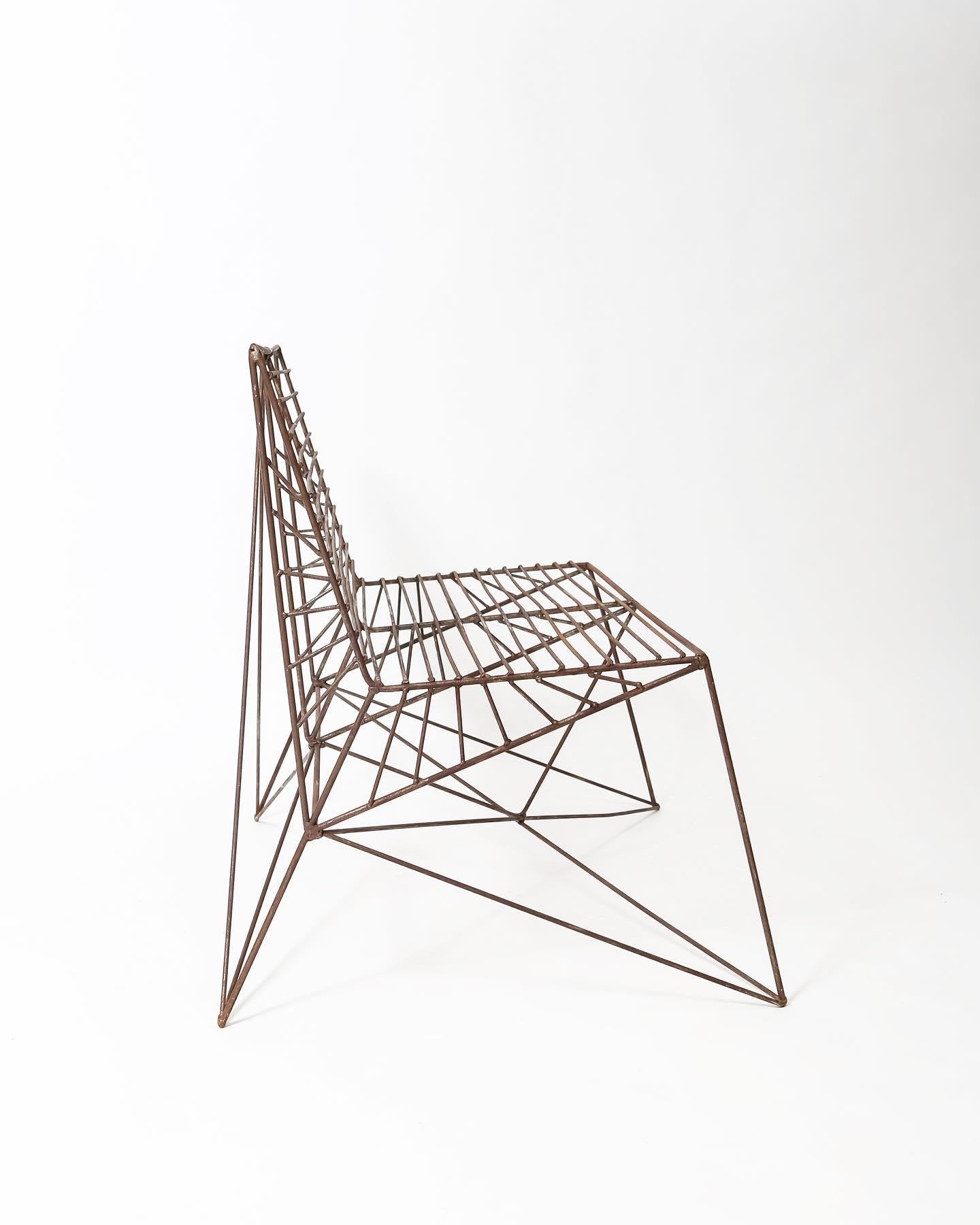 A compelling and sculptural seating option made from welded steel wire rod. As acquired, with rust in spots and nice overall patina. Very structurally sound, even comfortable. Geometric quality, reminiscent of Verner Panton but most likely