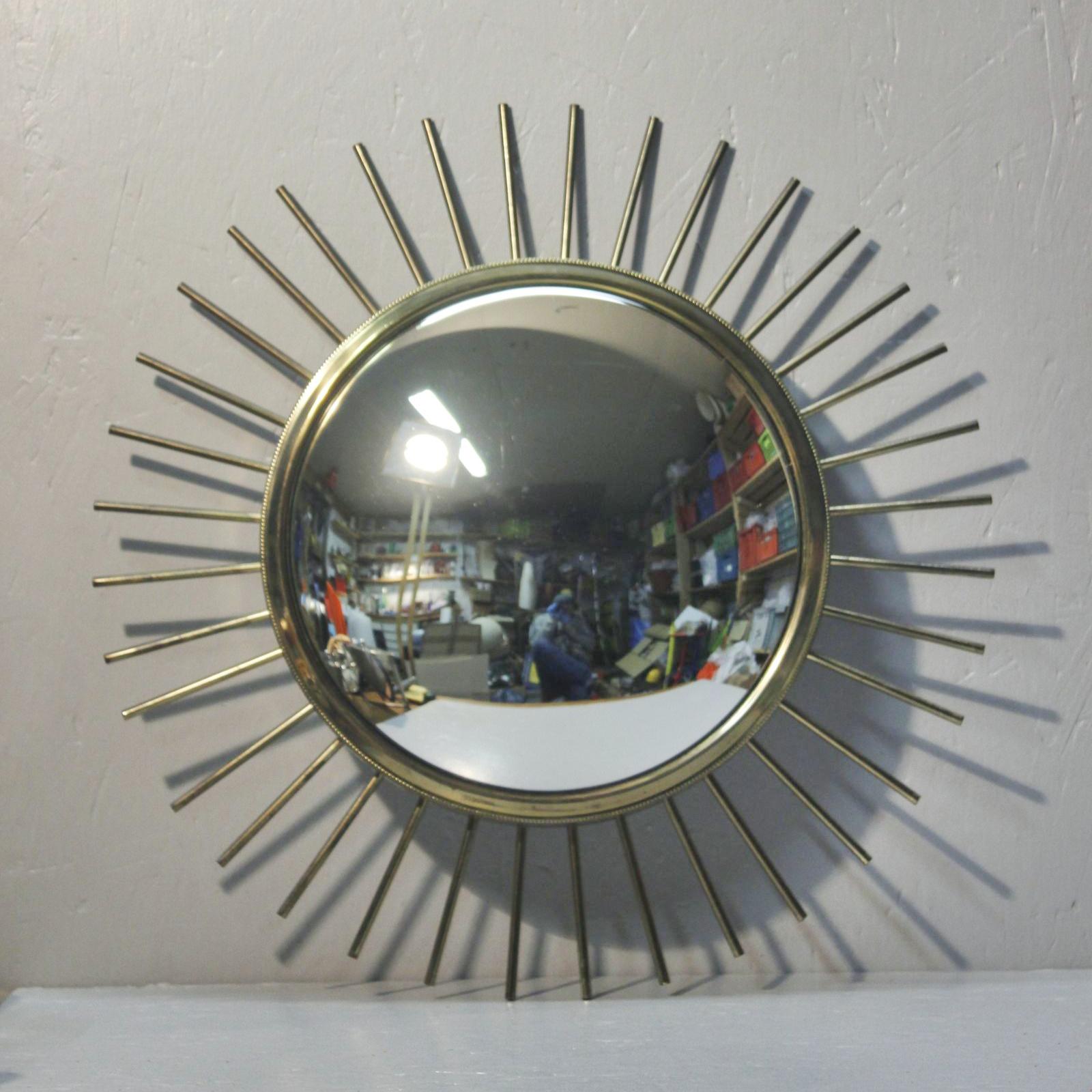 Beautiful gilded brass “Oeil de sorcière” sunburst convex wall mirror circa 1960. 

Very good condition