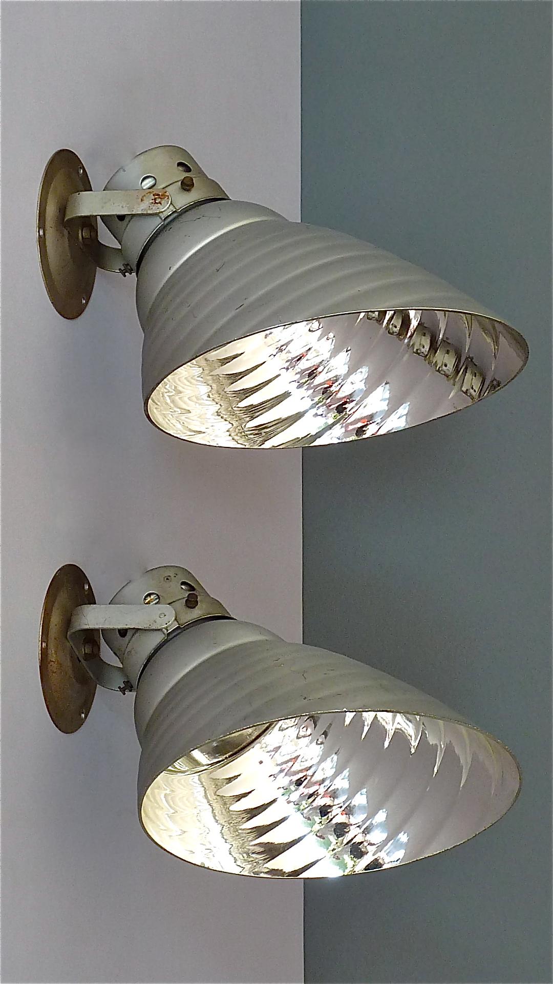 Gorgeous Carl Zeiss Ikon industrial wall / ceiling lamps probably designed by Adolf Meyer and manufactured in Jena, Germany, circa 1930 while the Bauhaus period. This “JS 5” lamp is the largest version of the in former times produced models. The