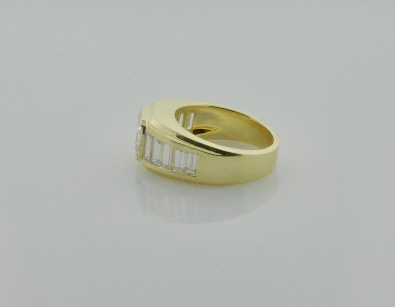 Emerald Cut Modernistic East-West Diamond Ring in 18 Karat Yellow Gold For Sale