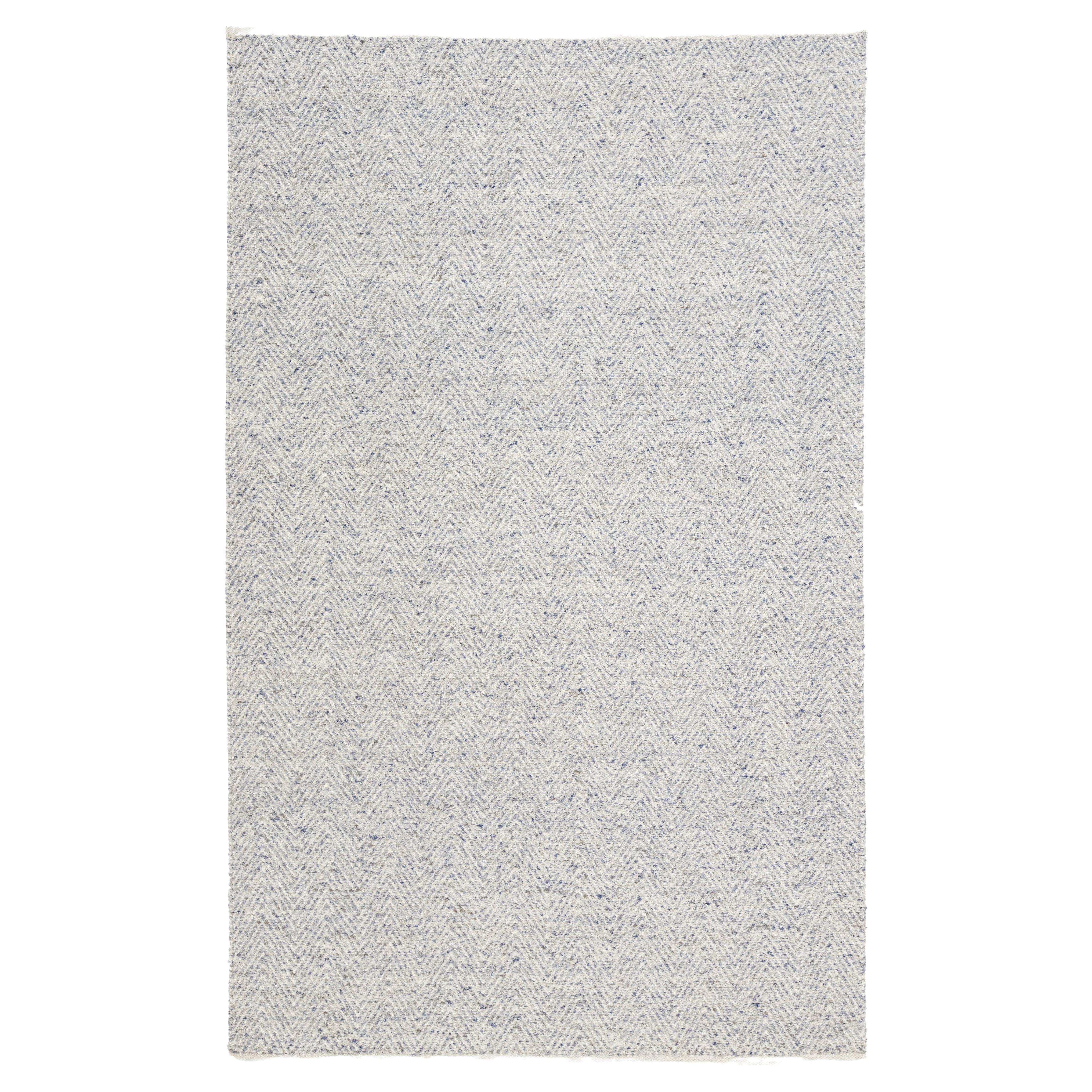 Modernly designed ivory wool rug handmade Textured Accents by Apadana