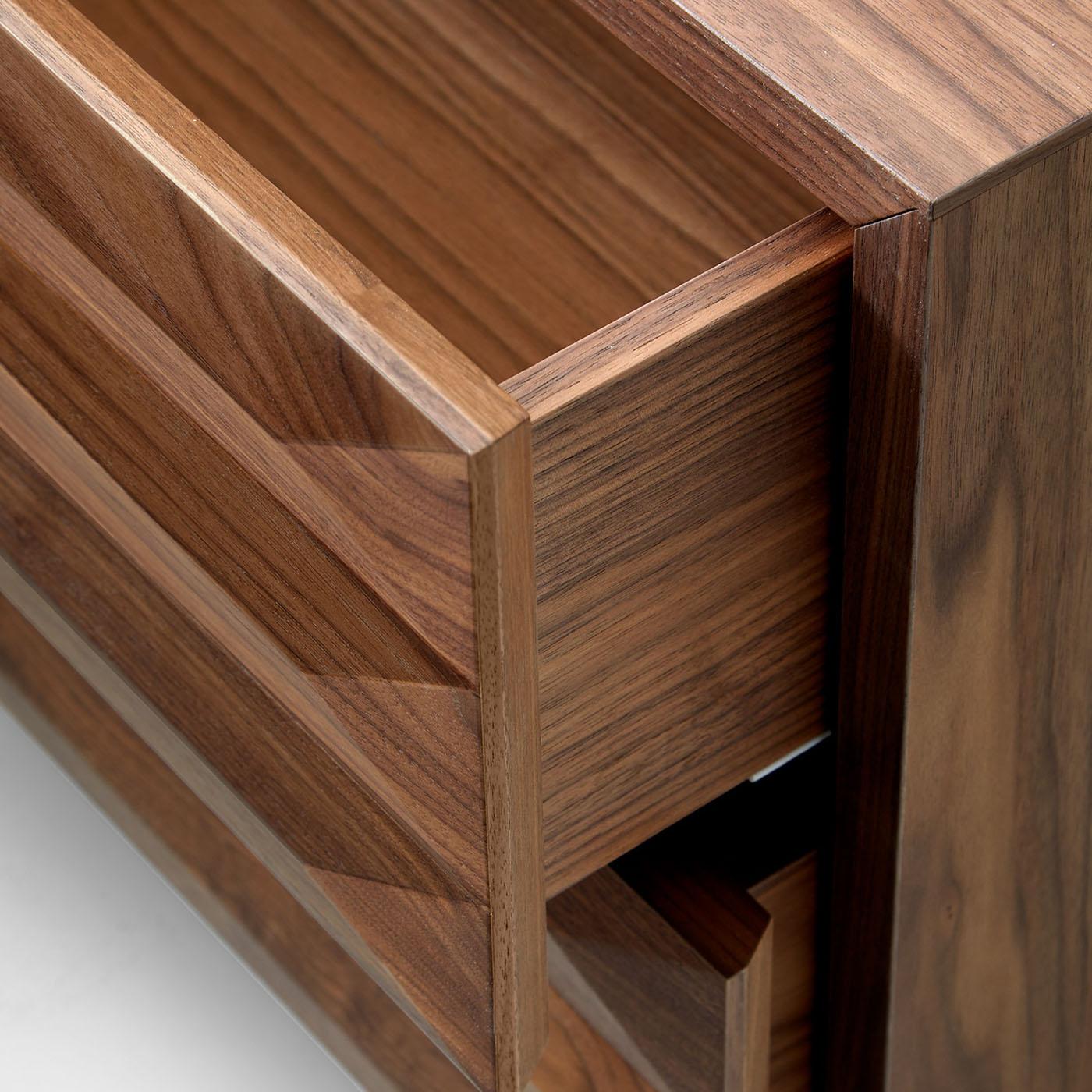 Modi chest of drawers with 6 drawers entirely made in Canaletto walnut. The drawers are also made internally in Canaletto walnut and slide on cushioned guides.