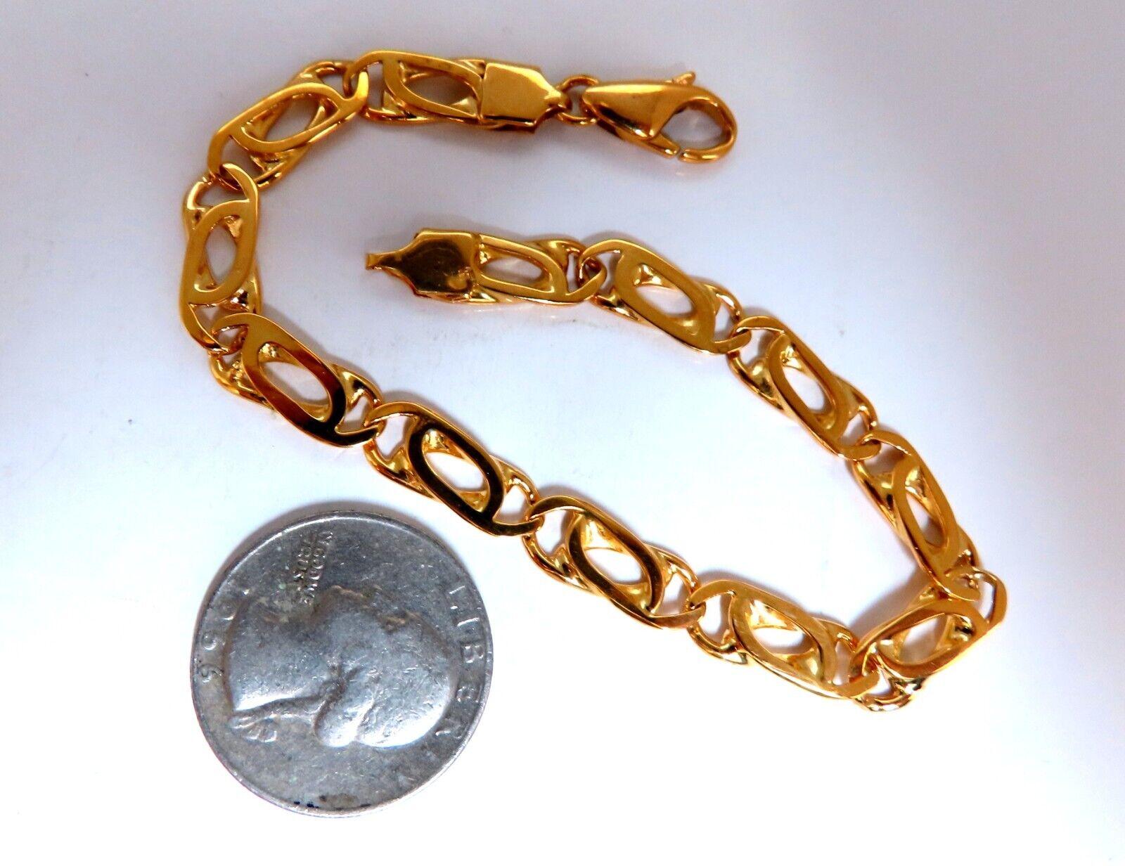 Paper Clip Link Chain Bracelet

Durable, Well Made

14kt. yellow gold

15.6 Grams.

8.5 inch long

6.8mm wide 