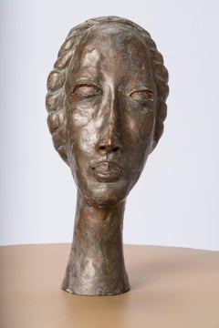Buste de femme en terre cuite patinée d'inspiration Modigliani, France, années 1930