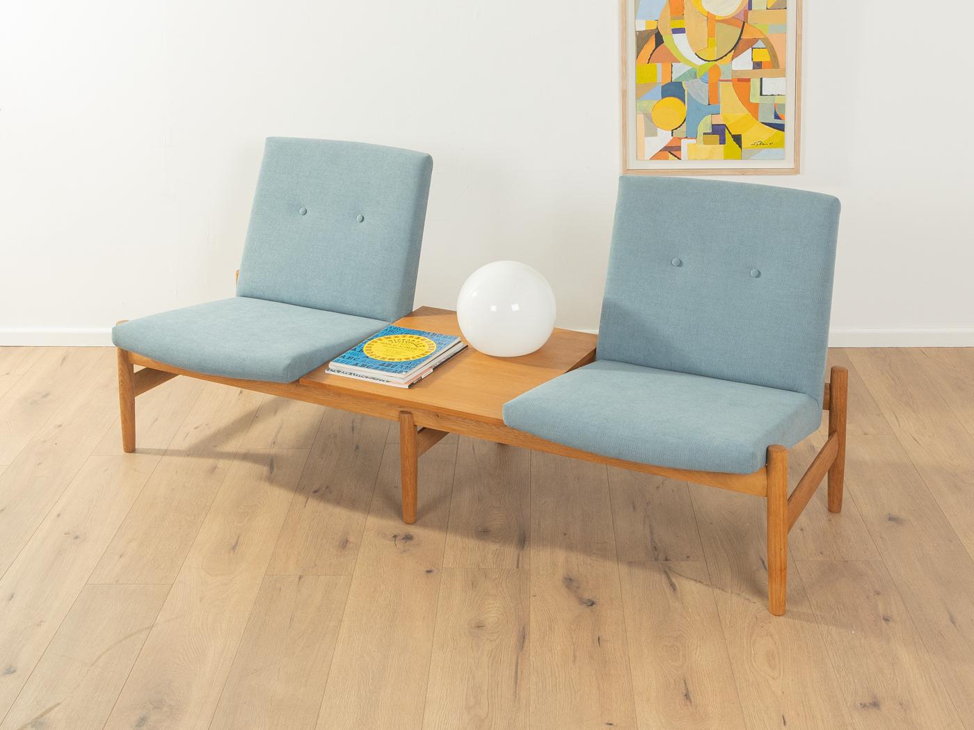Exclusive modular sofa from the 1960s by Gunnar Sørlie for Karl Sørlie & Sønner, Sarpsborg. Model SAGA with high quality solid oak frame. The sofa has been reupholstered, covered with a high-quality fabric in smoky blue and has received a new table