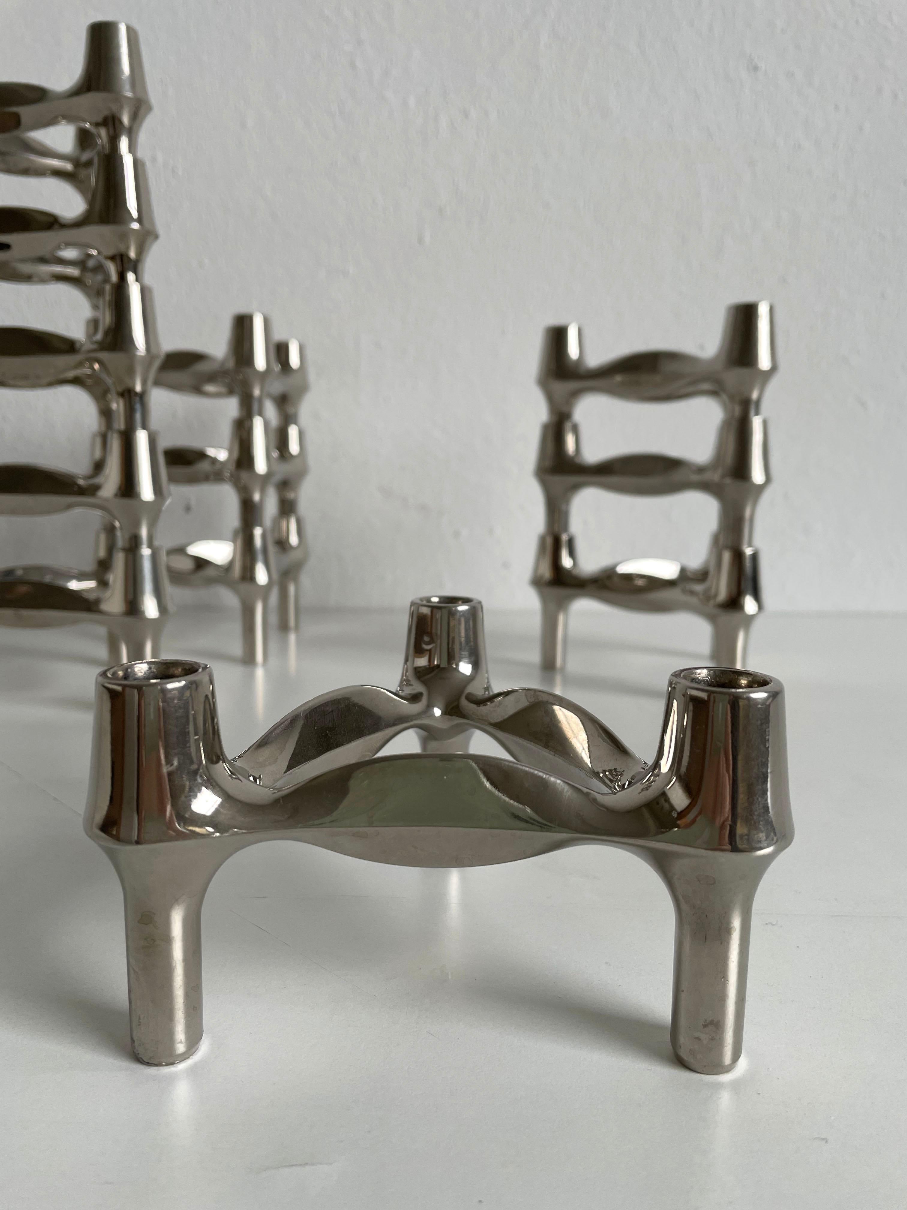 13 chrome-plated metal candleholder elements and 1 cup element, 1970s design decor, a wonderful addition to every modern home.

Iconic design classic

Producer: BMF Nagel, Germany

Design: Ceasare Stoffi, 1970s


The candlestick holders are