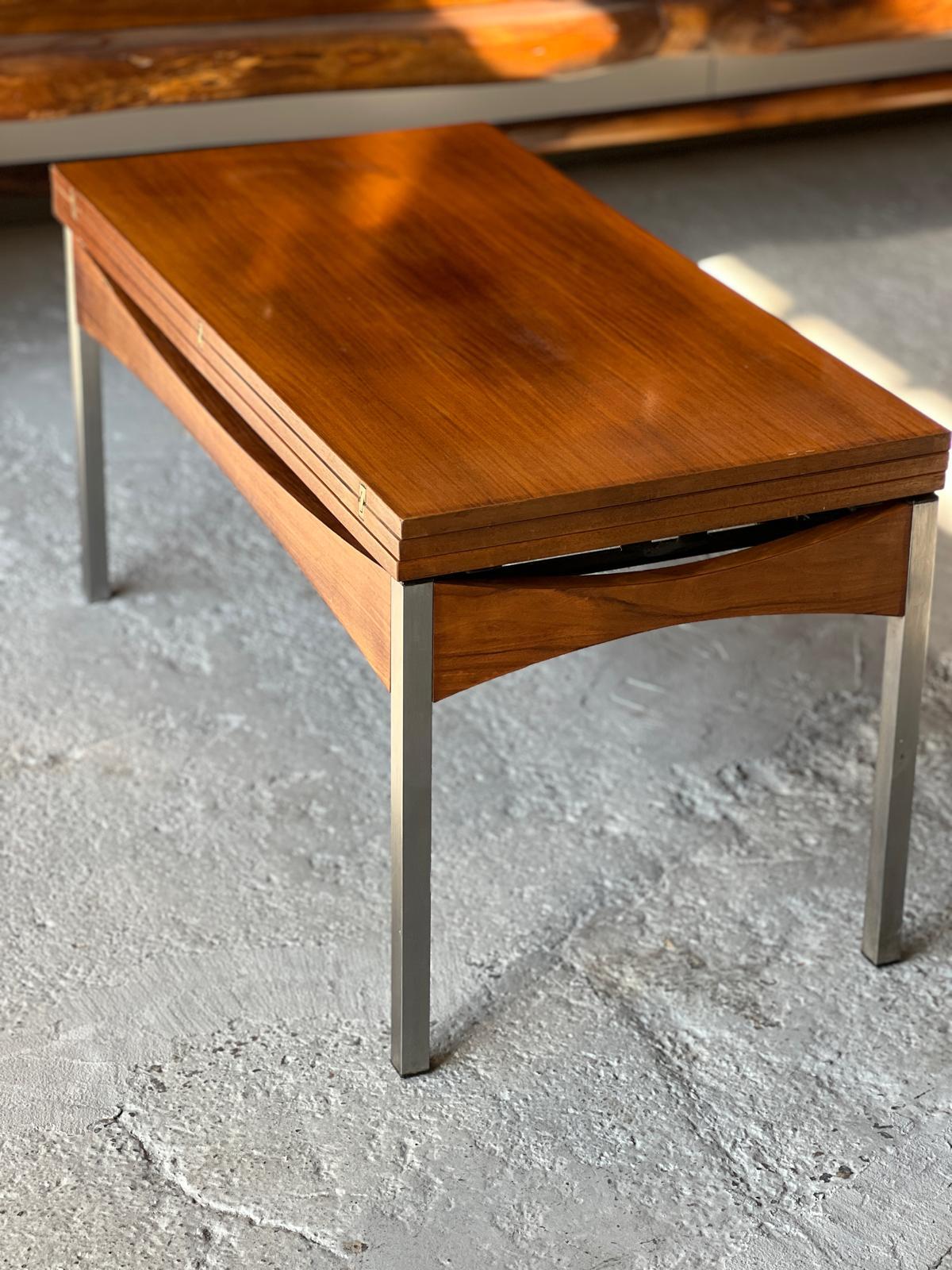 Modular coffee table by Albert Ducrot, and edited by Ducal1950. 
Structure is made of wood and metal in vintage style. 
Closed it serves as a coffee table, open it becomes a dining table for 6 people. 
The base is in oak
Dimensions 

Length closed