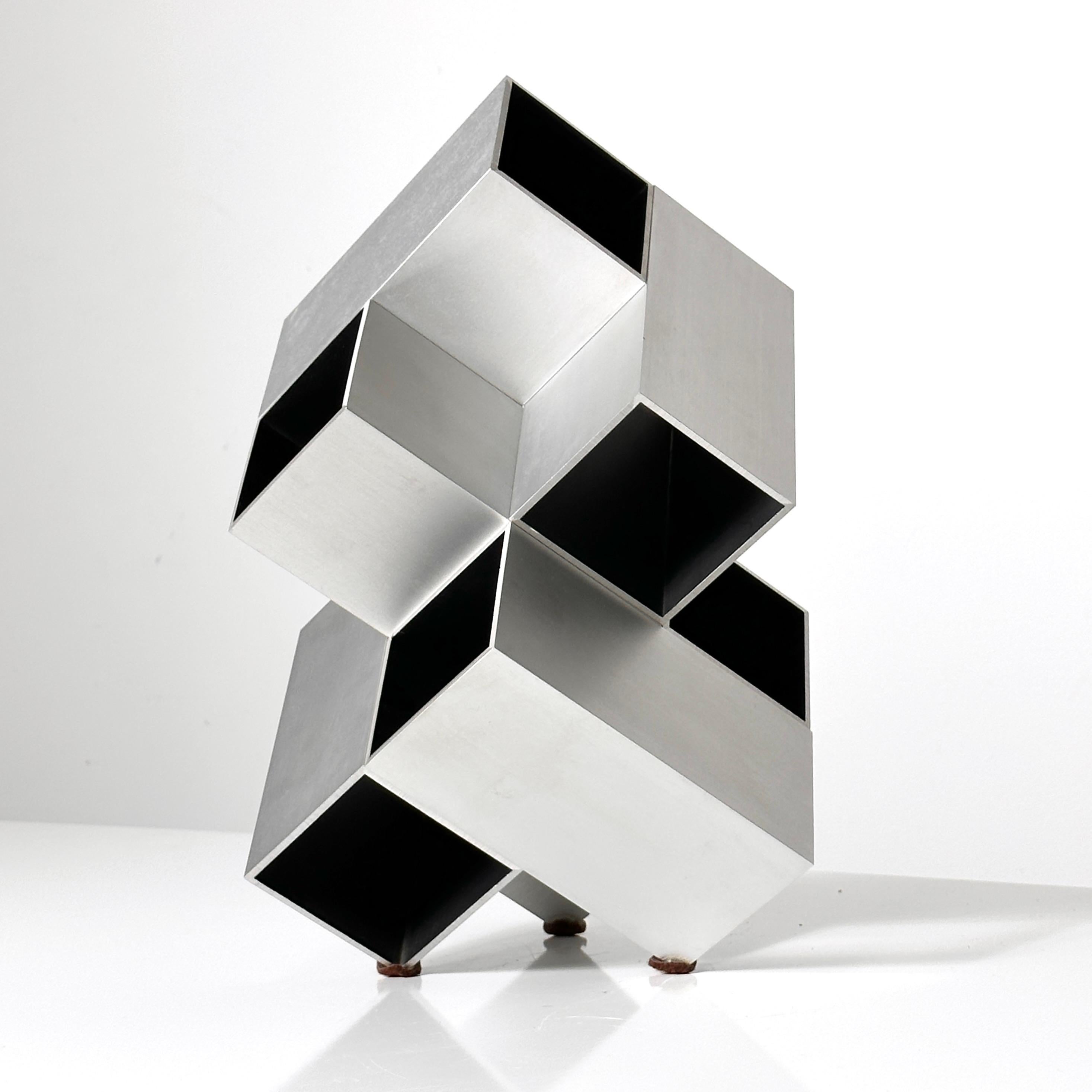 Modular Cube sculpture by Kosso Eloul Israeli artist 1920-1995
Sold in Toronto circa 1970s 
Brushed aluminum and black painted wood interior
Unsigned, which is typical as most were not. 

Kosso Eloul was born in the city of Murom, Russia. In