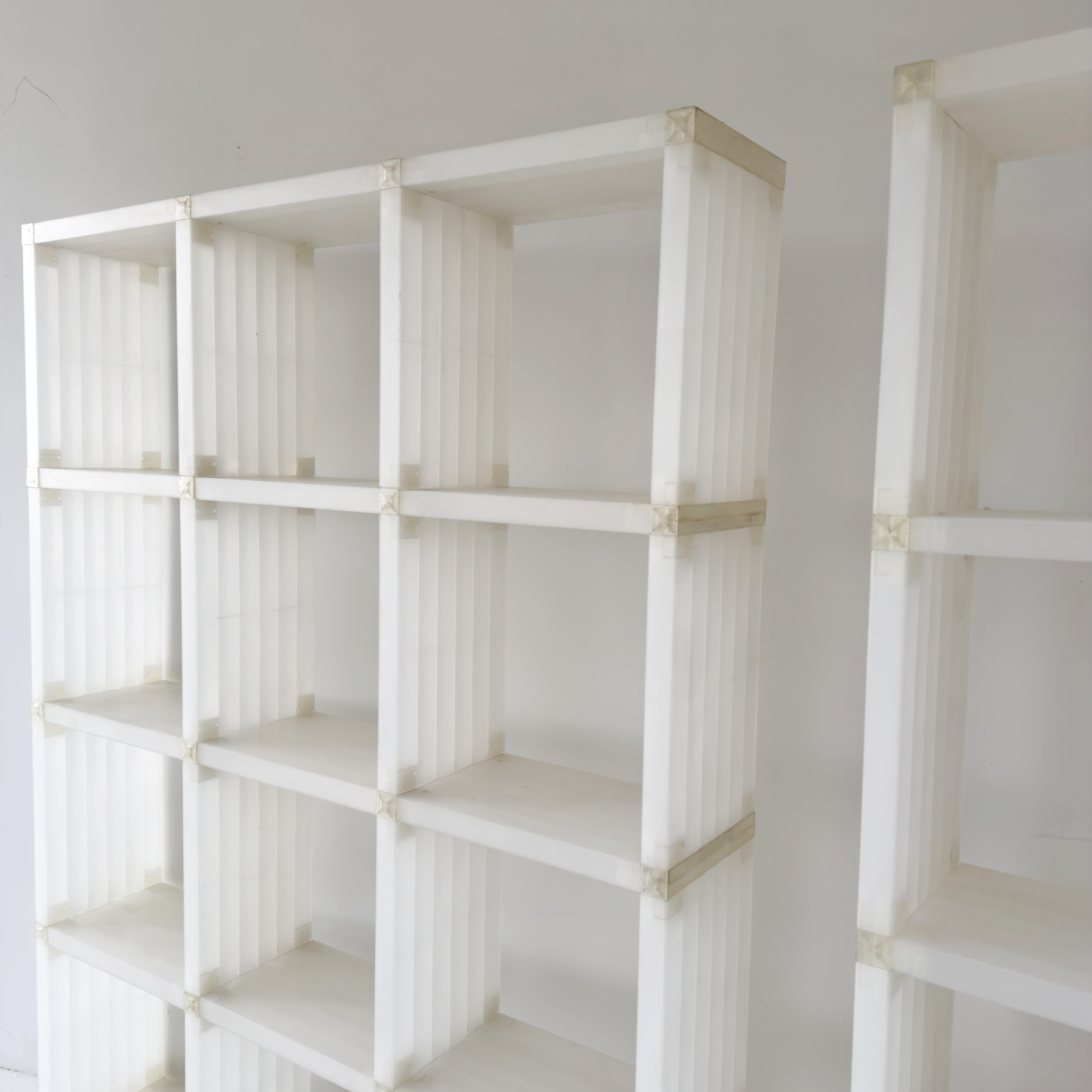 Iconic 20-cube modular shelving system designed by Doron Lachisch. Lightweight yet extremely sturdy, the Cubitec was celebrated for its simple grid design, clarity of form, and ability to adapt to endless configurations.

This set includes 20