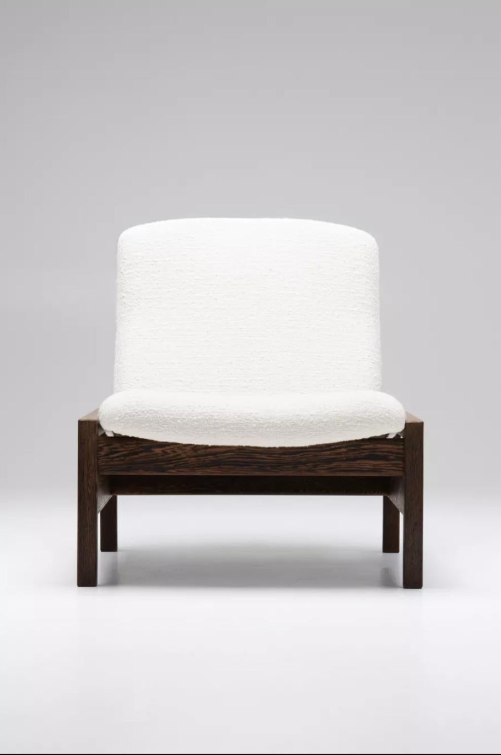 Minimalist modular easy chair, designed by Belgian designer Georges van Rijck for Beaufort in the 1960s.  This easy chair can be interchangeable in combination with the the other seating combination. This makes it possible to convert the armchair