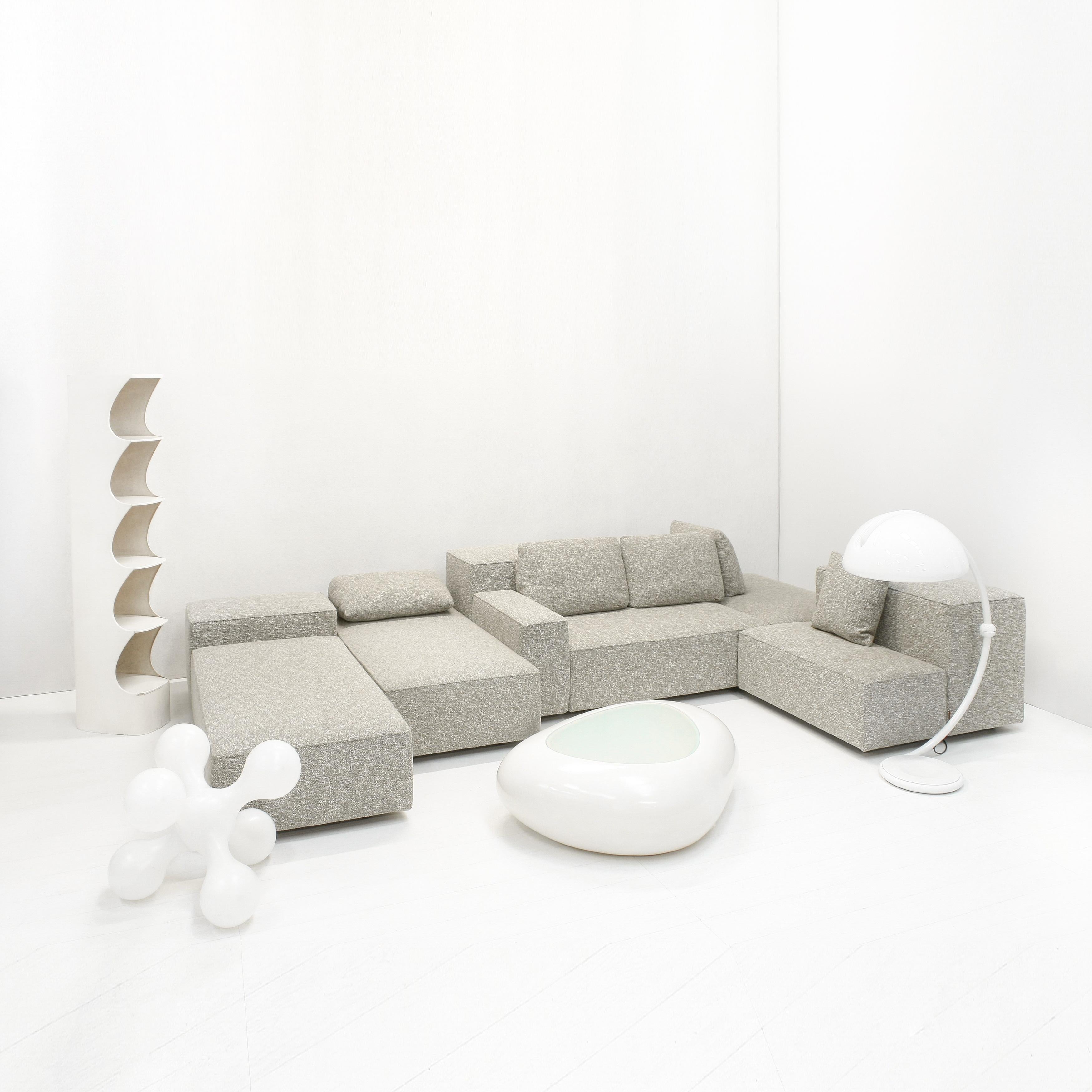 The DOMINO.18 element sofa was designed by Dick Spierenburg for the renowned Dutch company Montis. 

This set contains (LxWxH):
2 elements: 150 x 75 x 40 cm
2 elements: 125 x 75 x 40 cm
1 element: 100 x 50 x 40 cm
1 element: 100 x 50 x 71 cm
1