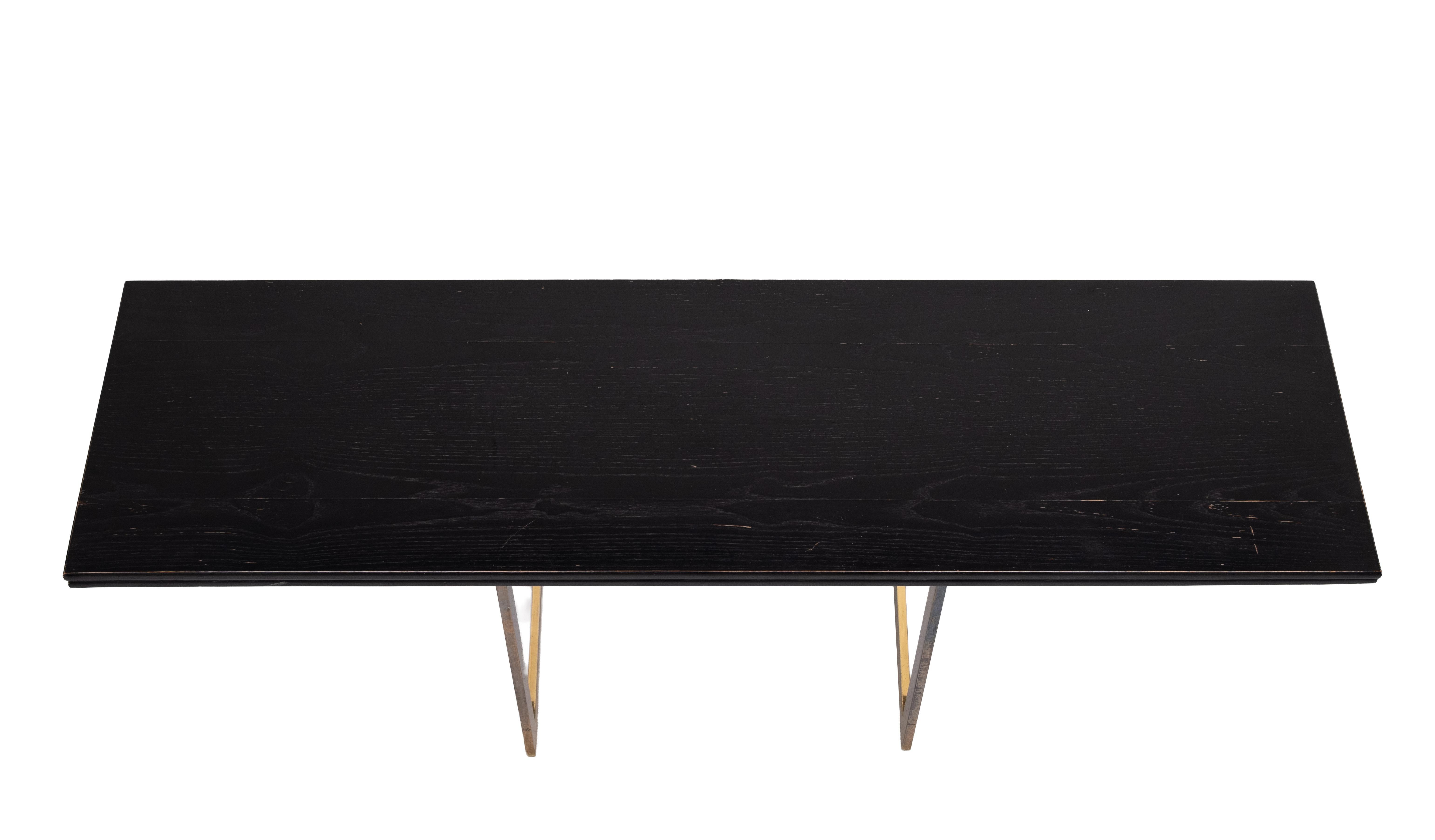 Very nice multi functional Console or Dining table . 
Brass folding out legs . Black Ebonized Oak top. 
Easy in use  just put the legs open and folding out the top . 
great looking for desk use .  Depth 45 cm to 90 cm .

 please ask for better