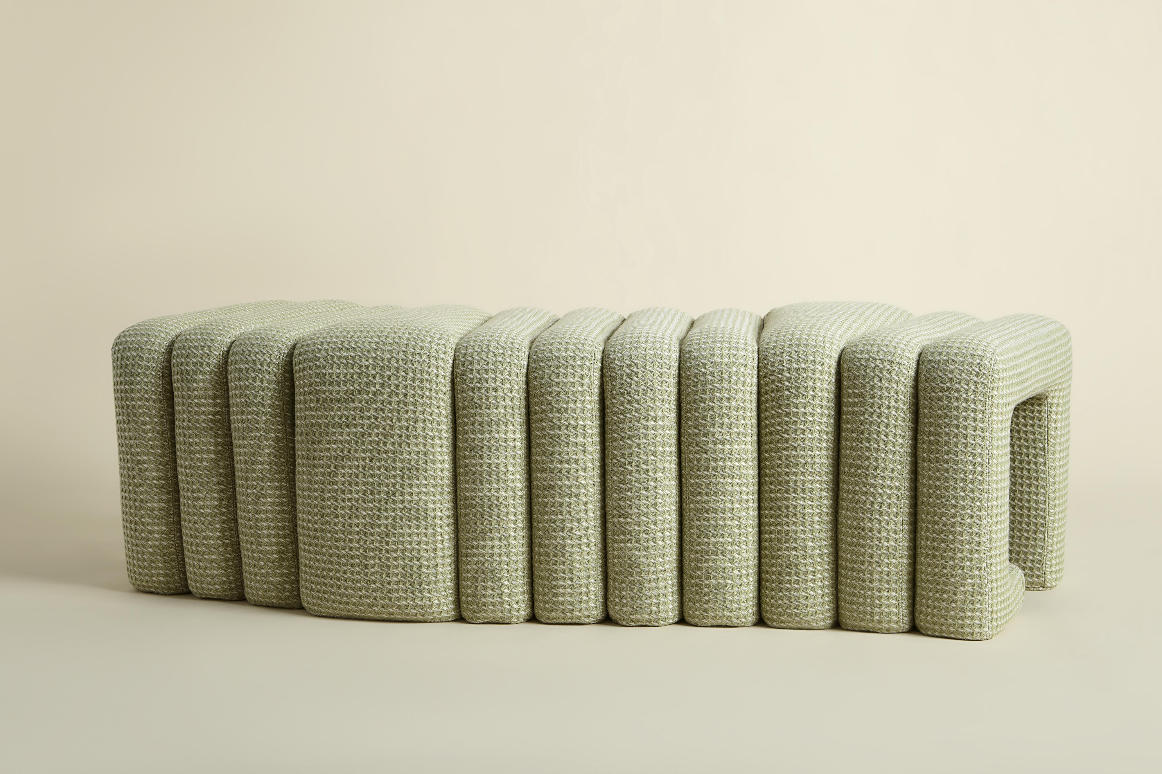 Product Name: Meta Bench
Colours: Braemar (light green)
Materials: Red pine, Upholstery foam,
Bute 100% pure new wool.
Dimensions: (H) 480mm x (W) 1520mm x (D) 510mm

A modular curved bench - upholstered in Bute 100% pure new wool fabric.

Part of