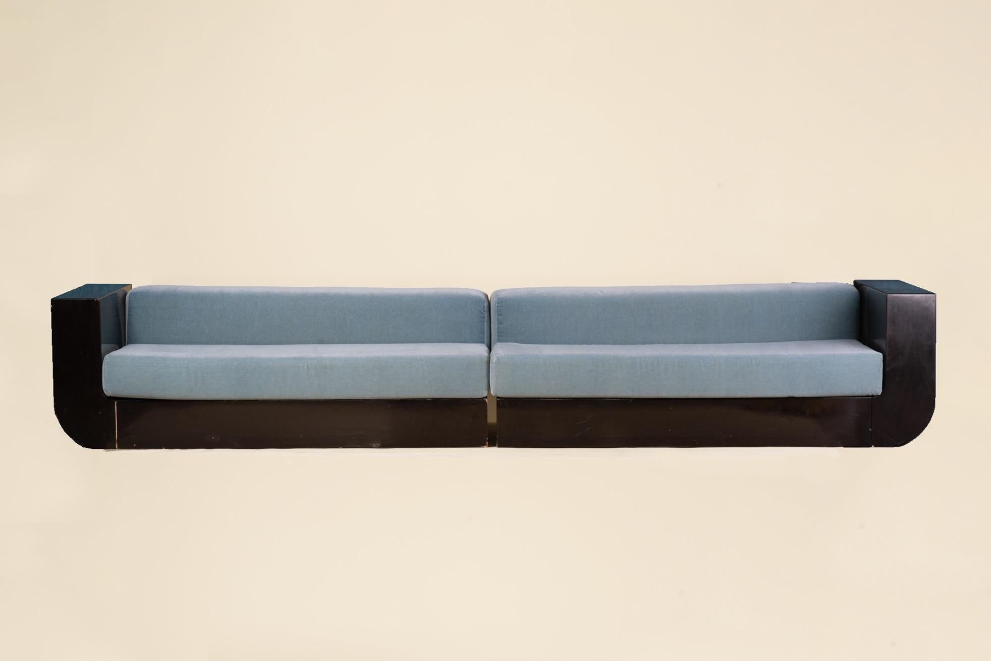 This modular sofa features a lacquered wooden frame and has been newly reupholstered in luxurious Dedar mohair, offering a soft, understated finish. Composed of two elongated modules and a central square unit, the design allows for versatile