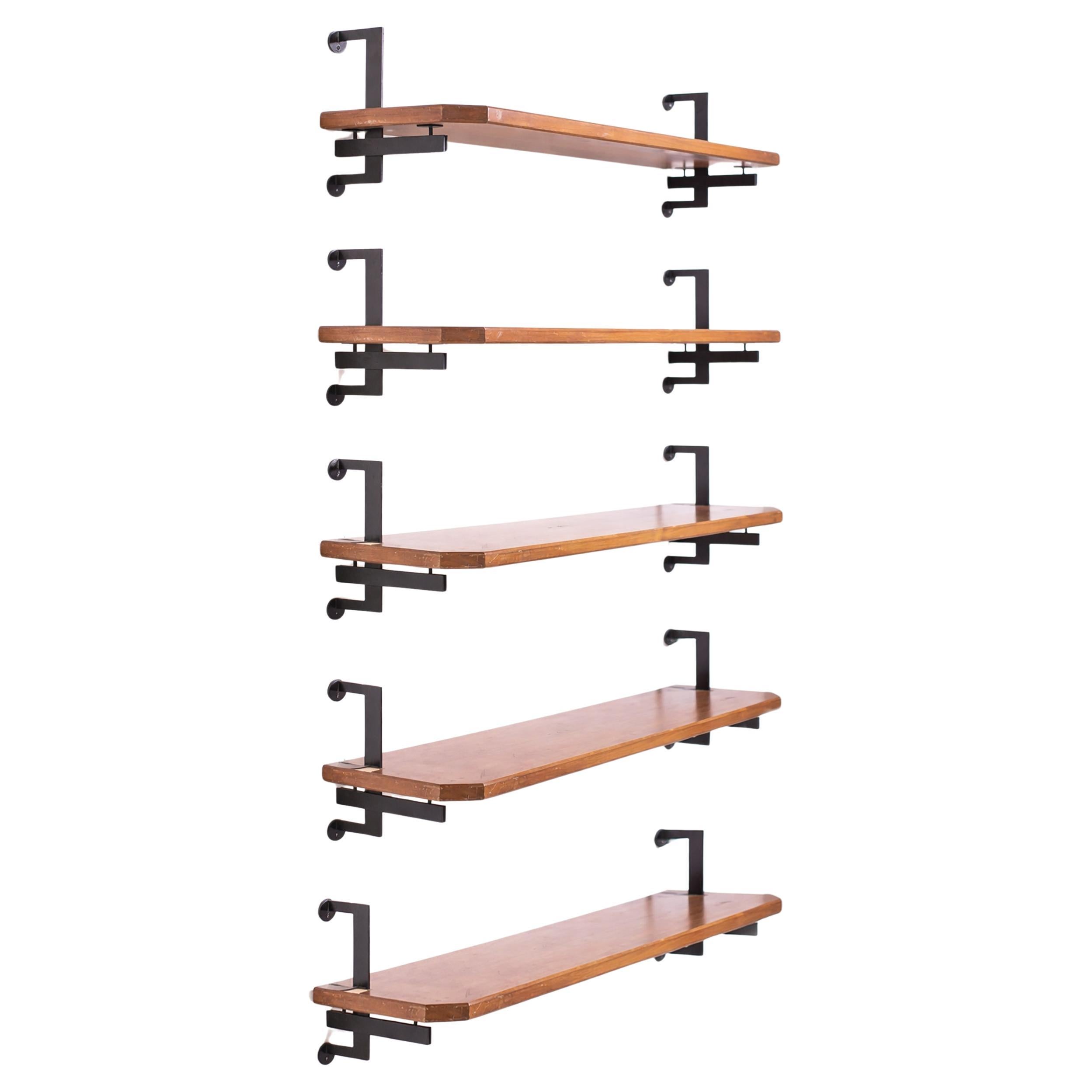 Modular Italian bookcase made of shelves and brackets by Studio BBPR Attr.