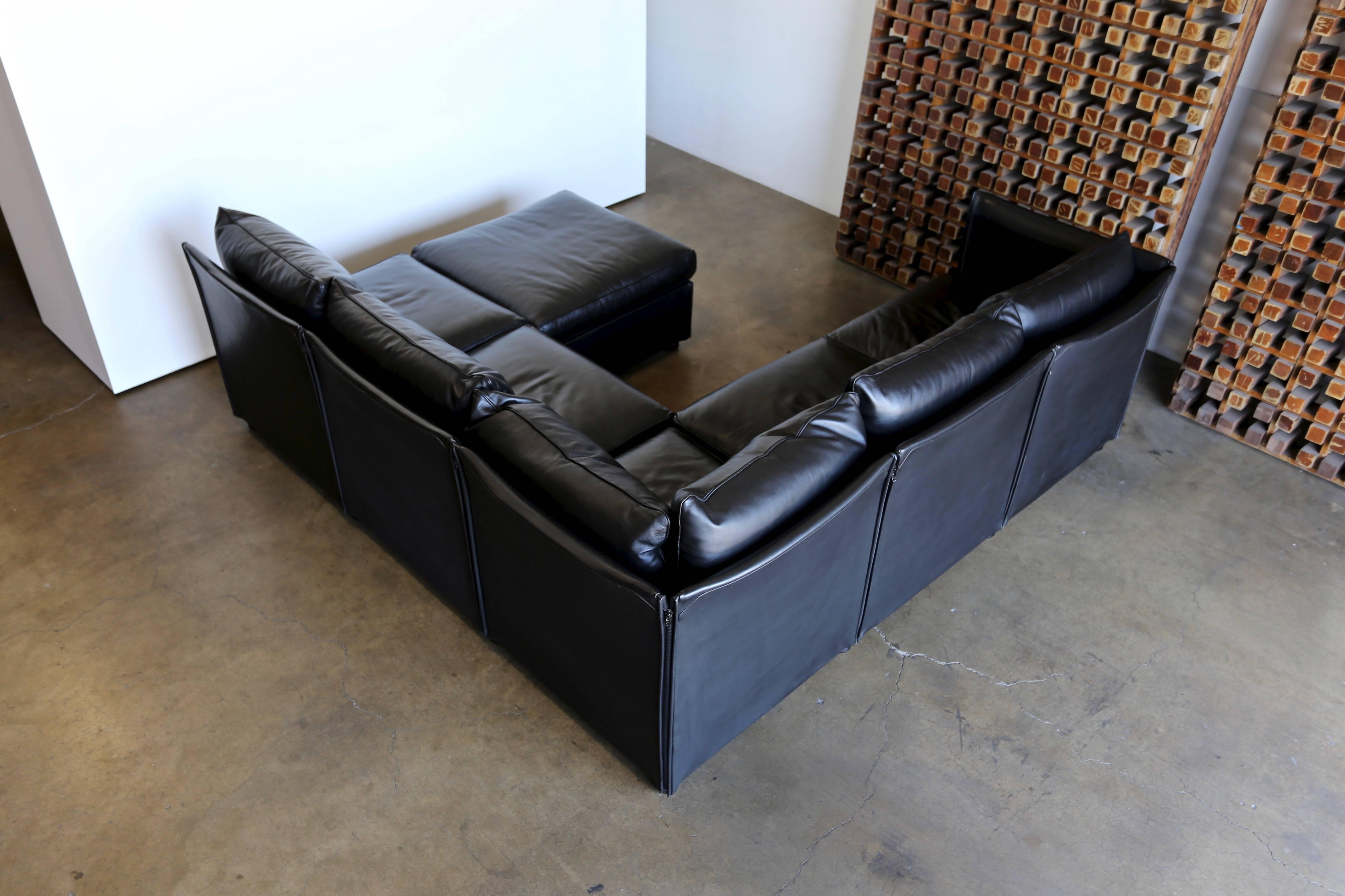 Modular leather Char-a-Banc sofa by Mario Bellin for Cassina. Seven pieces that can be configured to best meet the spaces needs. 

The listed measurements are of the sofa layout pictured in the 1st image.