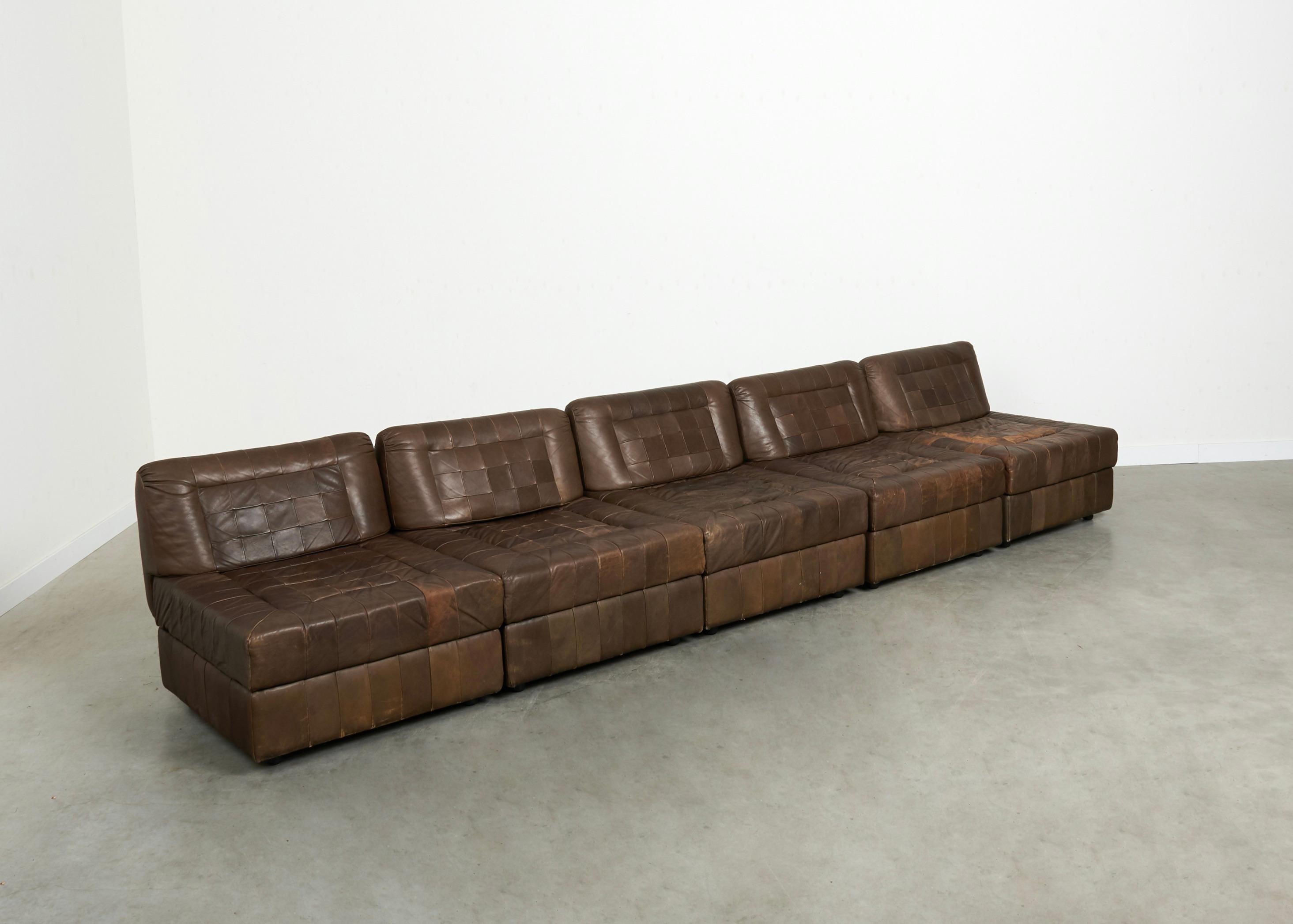 Lafer S.A. modular sofa by Percival Lafer, Brasil 1960s.
Patchwork leather upholstery. All back rests are dismountable.
All elements are in very good condition, with nice patina.