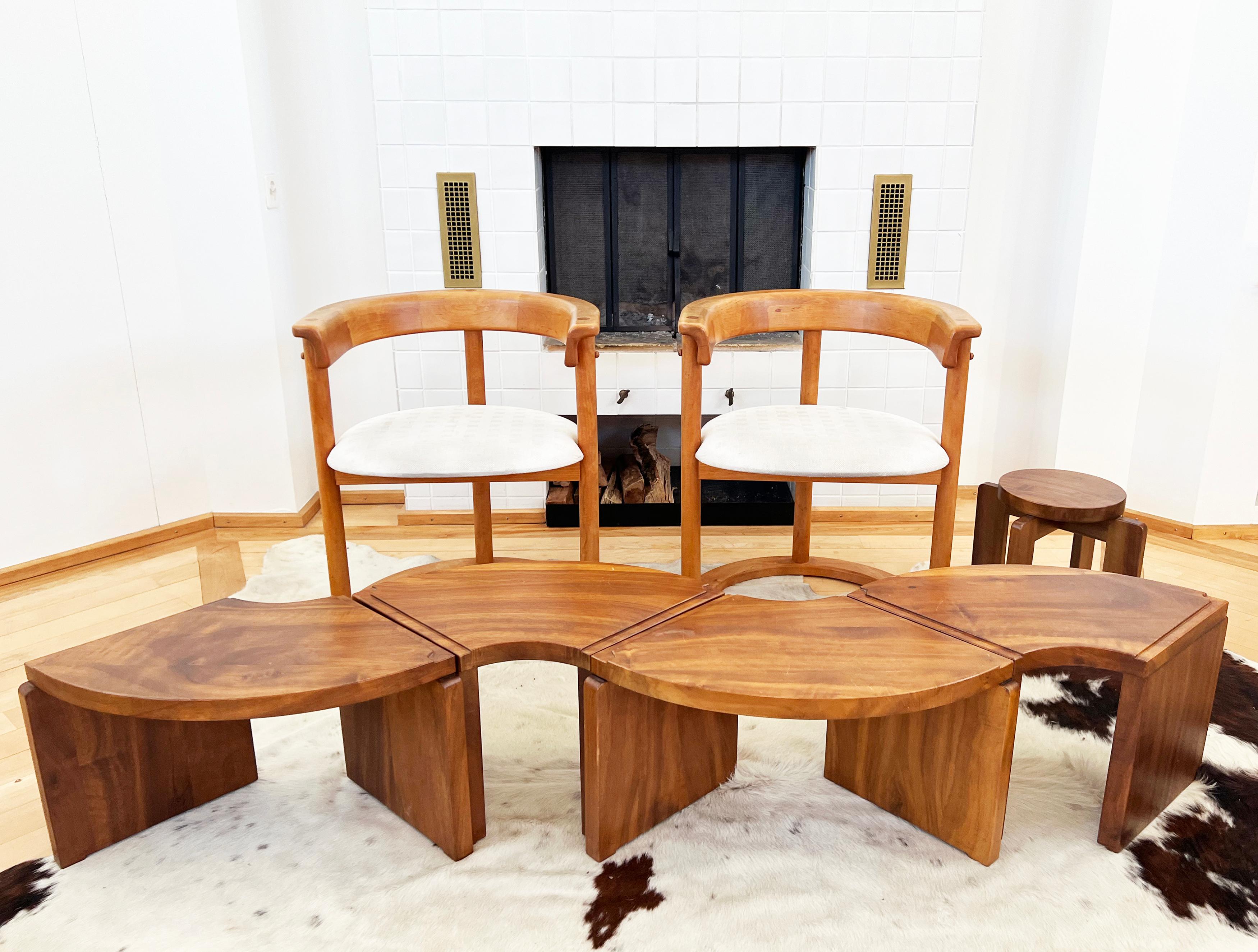 Incredible, completely stunning design. Solid walnut 5 piece set in the manner of Harvey Probber-- “Nuclear” modular coffee table. Transforms from one round modular coffee table into separate seats seats or a long bench. Designed in 1949 by Harvey