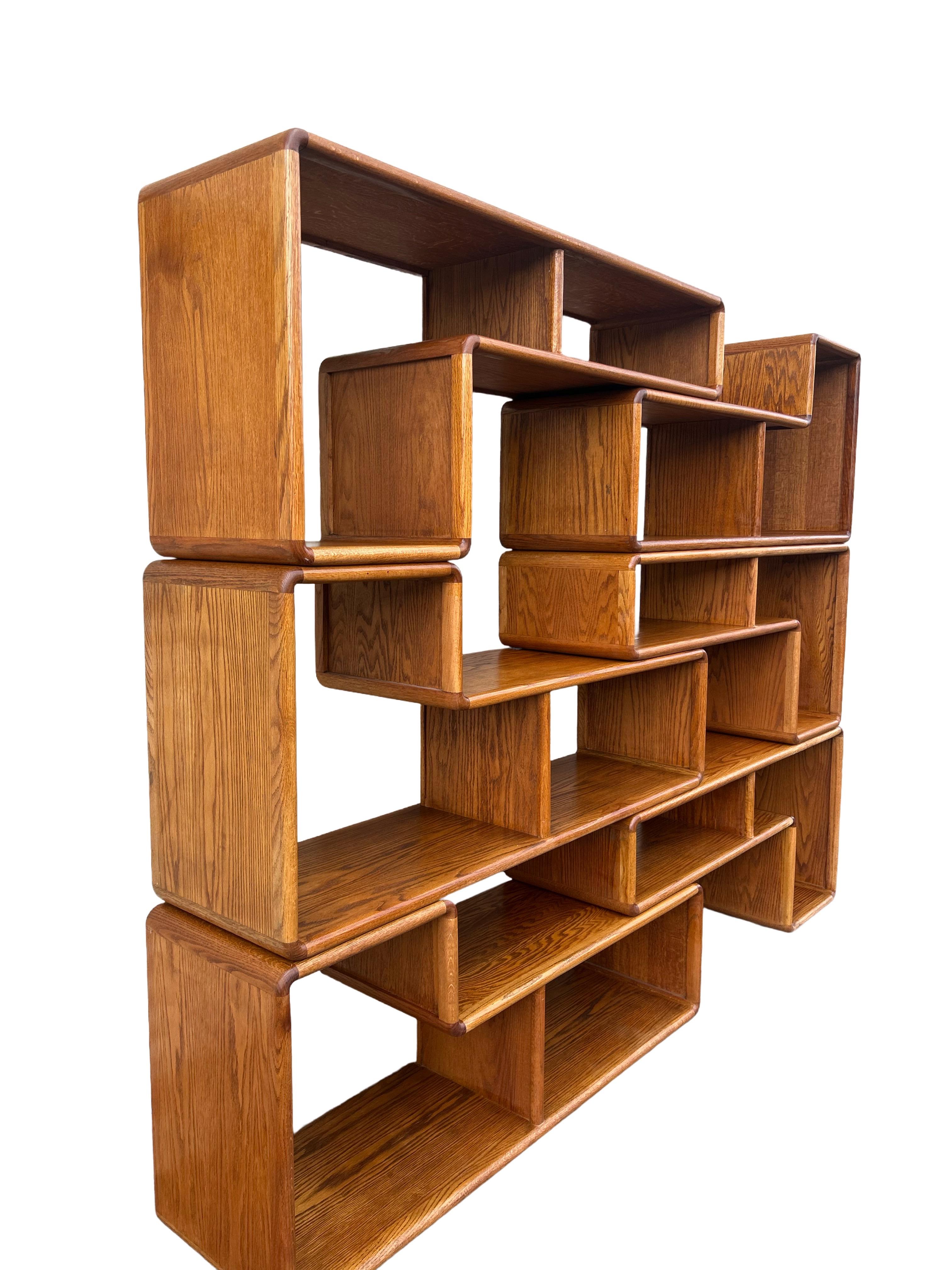 6 beautifully crafted oak bookcases. Modular design. Stackable to create a wall unit or room divider. Or separate to use as multiple modular units. (Horizontal or vertical)

These pieces can also be stacked to create a corner unit as well in a