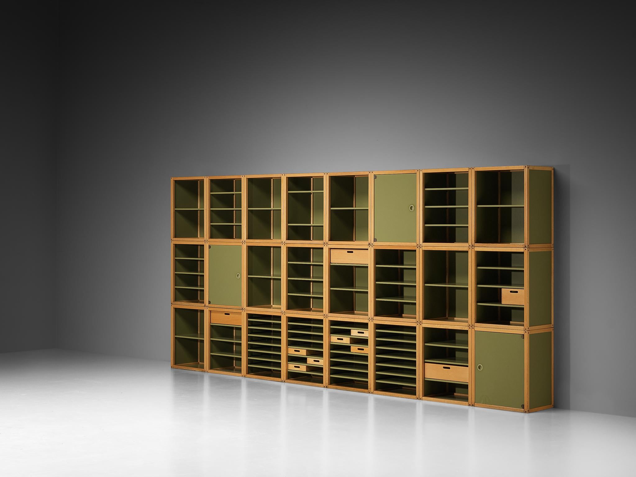 Flötotto, modular sideboard 'Profilsystem', obeche wood, laminate, 1970s/80s

Remarkable in both design concept and execution, this multifunctional modular storage wall unit stands as a groundbreaking innovation by the German furniture company