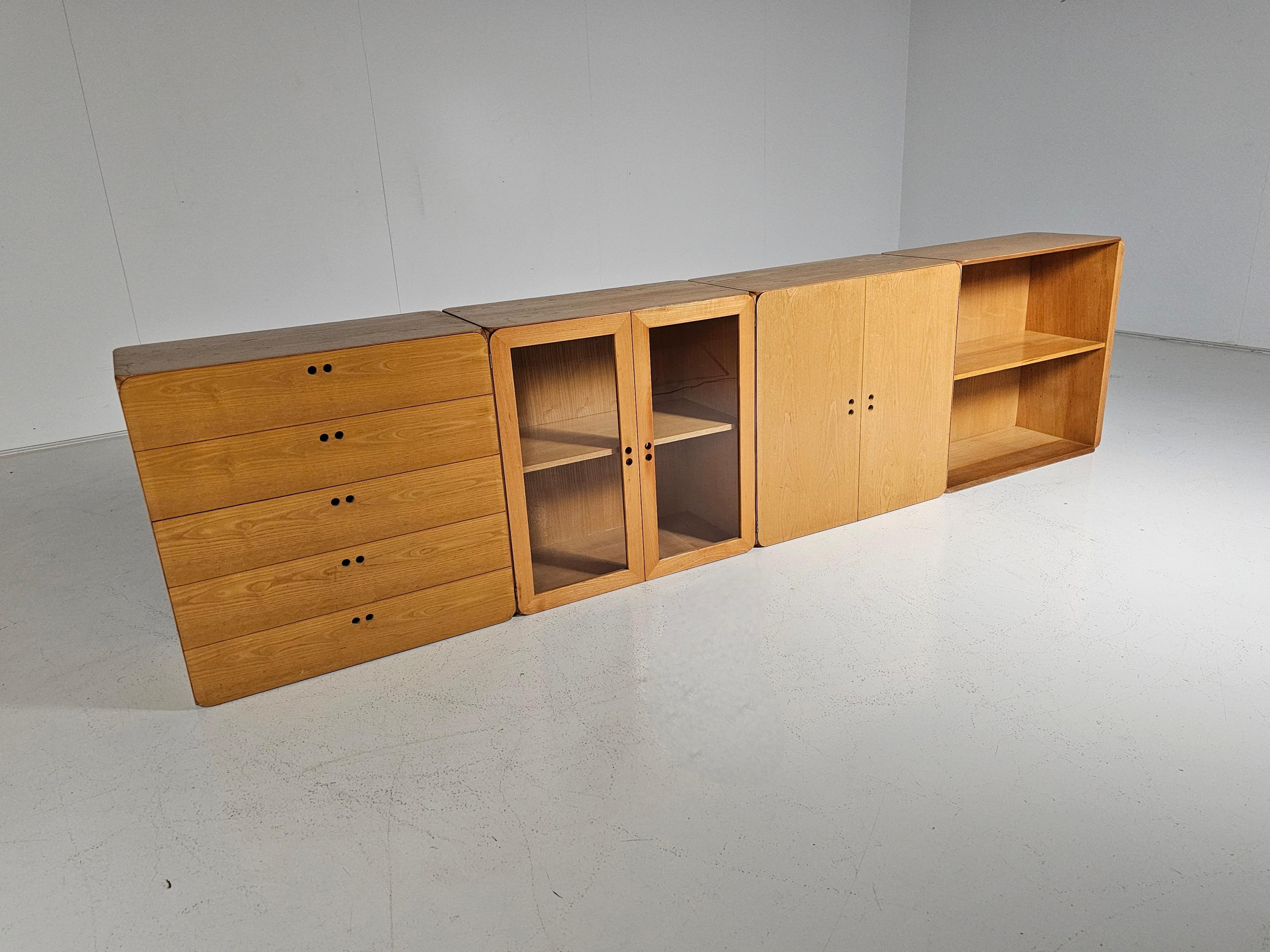 Modular wooden Samara storage wall unit by Dutch designer Derk Jan de Vries, created in the 1970s. This modular storing unit consists of four volumes and includes shelves and drawers. It provides sufficient space to store and display items such as