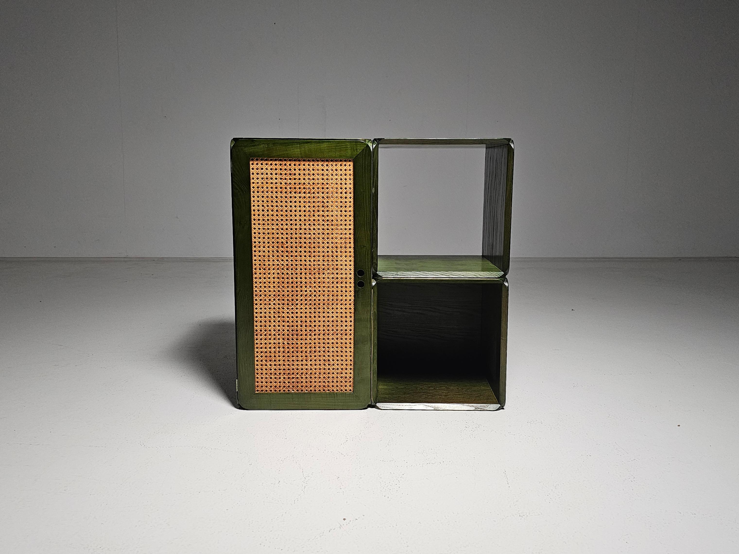 Modular wooden Samara storage wall unit in ash wood with a green finish. Designed by Dutch designer Derk Jan de Vries, created in the 1970s. 

This modular storing unit consists of three volumes and includes shelves and a cabinet.. It provides