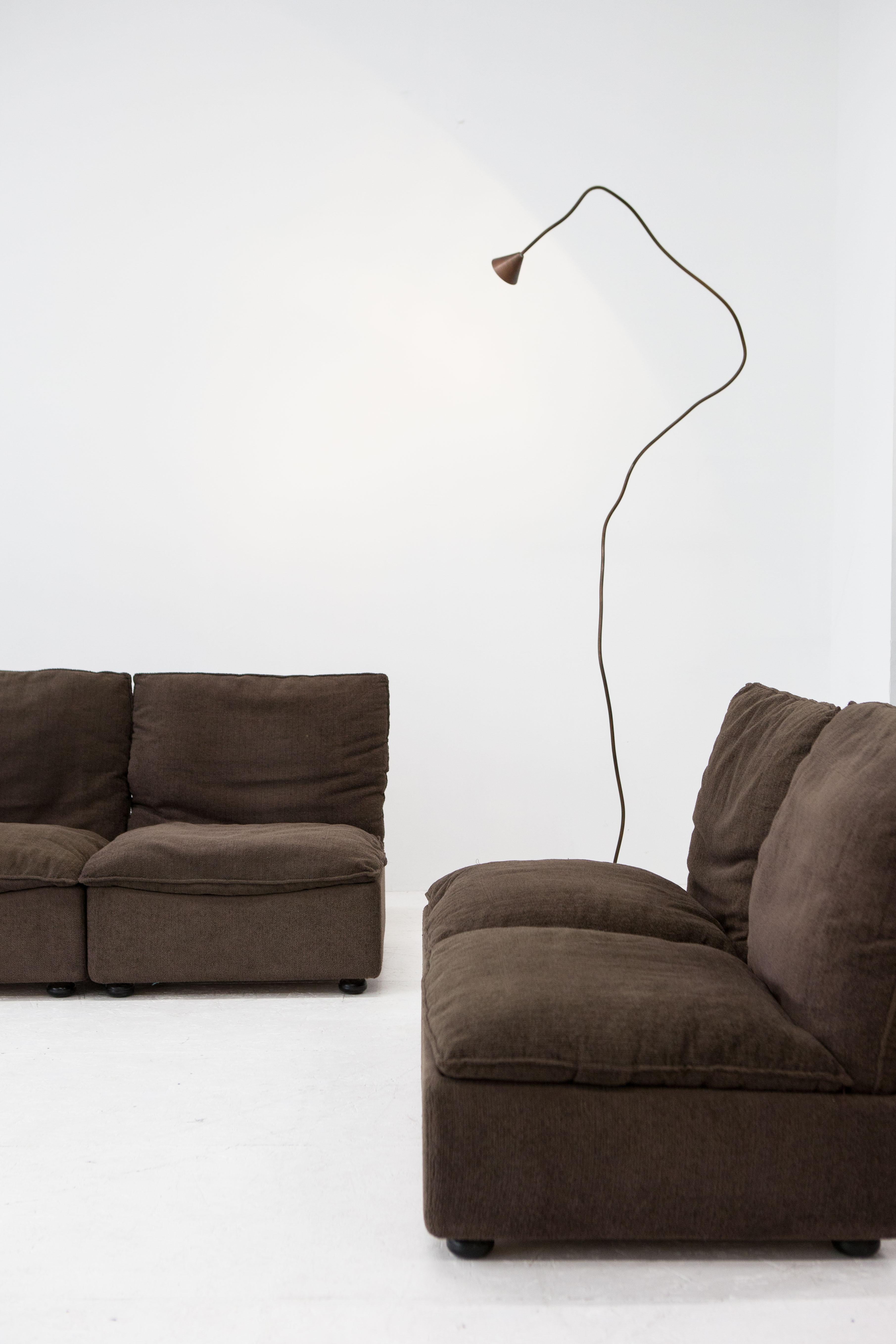 Aldo Davico’s modular sofa is unique in its design because apart from the various elements, neither its cushions are fixed and thus remain modular. They can be attached to their seats and backrests by convenient straps. 

In its dimensions and