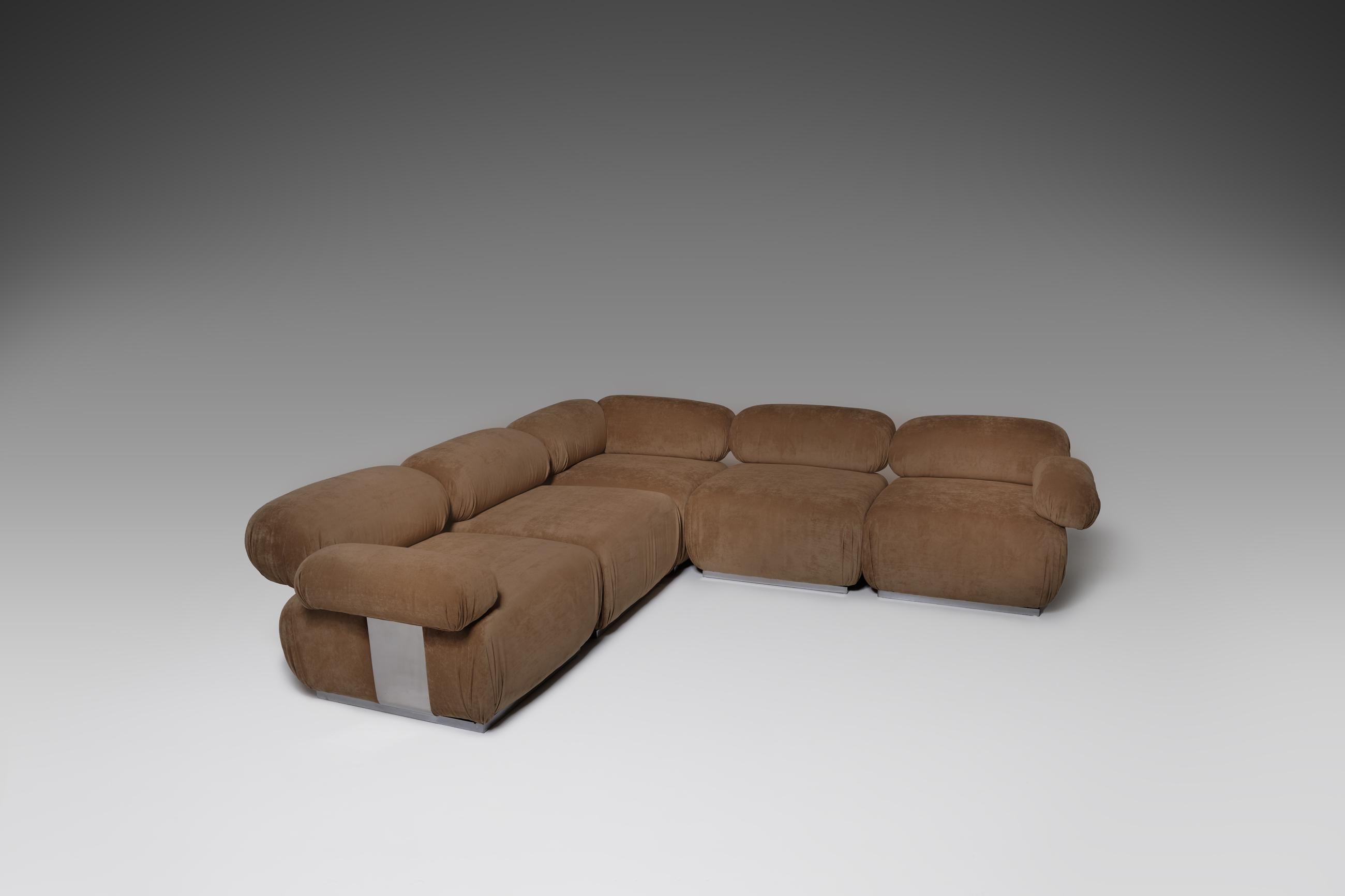 Stunning modular sofa 'Il Colombaccio' by Roberto Iera for Felice Rossi, Italy 1970. The sofa is composed of different large scale block units upholstered in a sand colored velvet which contrasts beautifully with the folded polished stainless steel