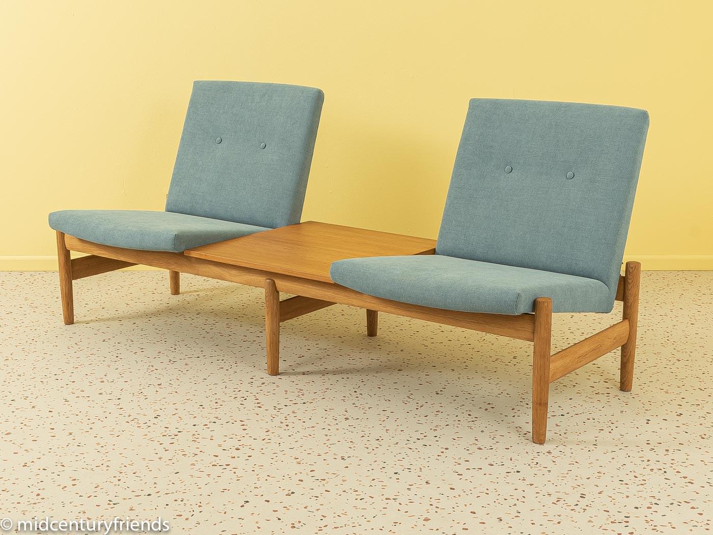 Exclusive modular sofa from the 1960s by Gunnar Sørlie for Karl Sørlie & Sønner, Sarpsborg. Saga model with high quality solid oak frame. The sofa has been reupholstered, covered with a high-quality fabric in smoky blue and has received a new table