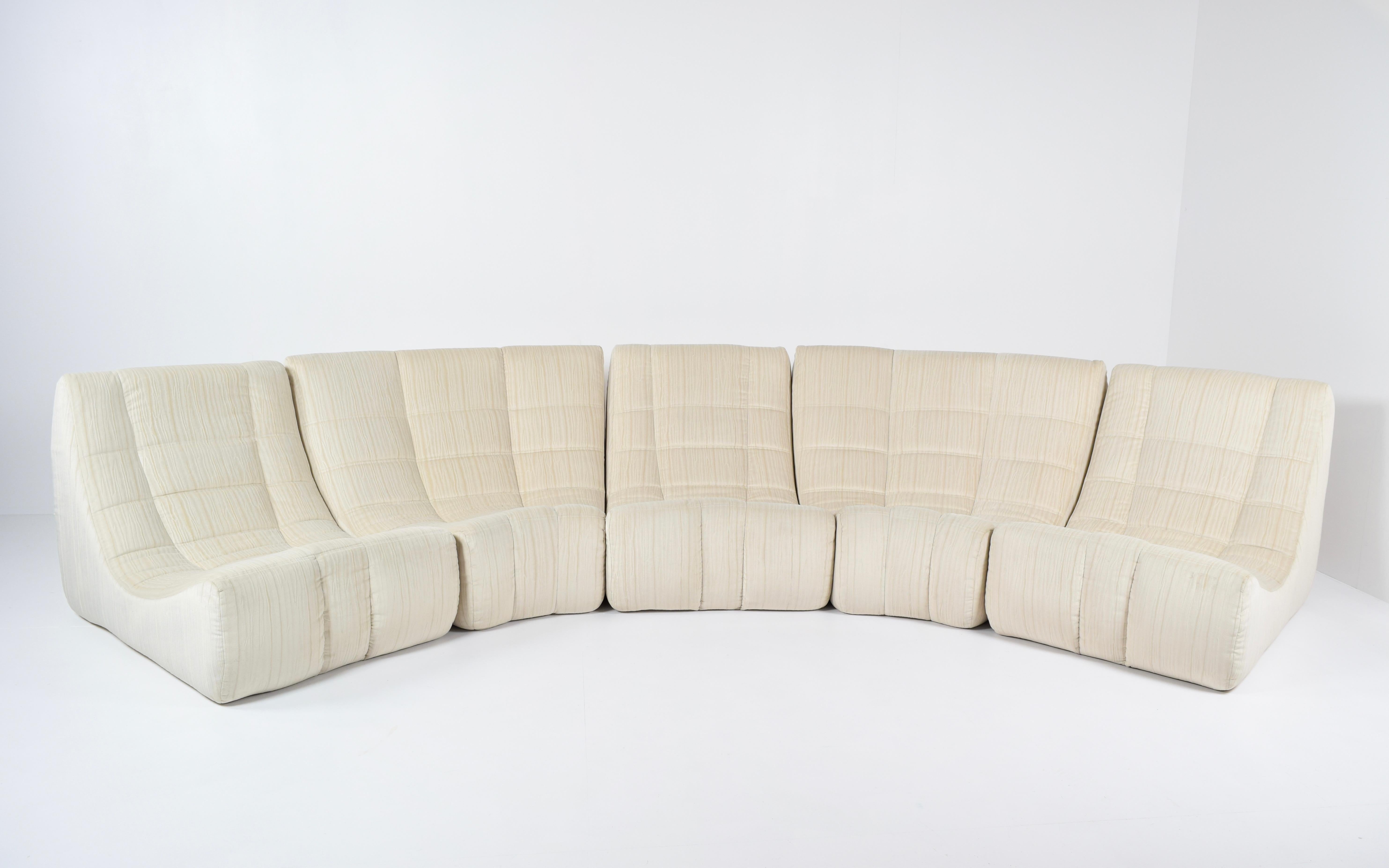 Impressive large modular sofa 'Gilda' by Michel Ducaroy. This sofa is very rare and produced by Ligne Roset in 1972. It consists of five pieces in two variations (two larger pieces and three smallers ones) connected by metal buckles, forming about a