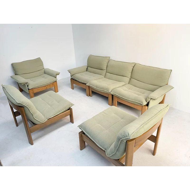 Modular Sofa Set in Oak with Green Fabric

An 1970's modular oak sofa set with an amazing green fabric. The sofa can be configured as shown or in sections around the room. It is upholstered in a beautiful green fabric with a great colour. The set is