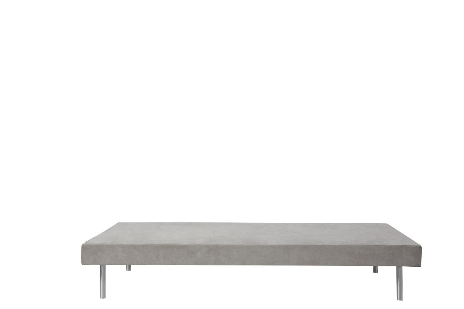 The unique personality of the architectural office is held in a playful sofa with a striking visual presence. Arquitectura-G plays with the concept of solidity through extremely simple bodies. Its prismatic square and triangular cushions sit on
