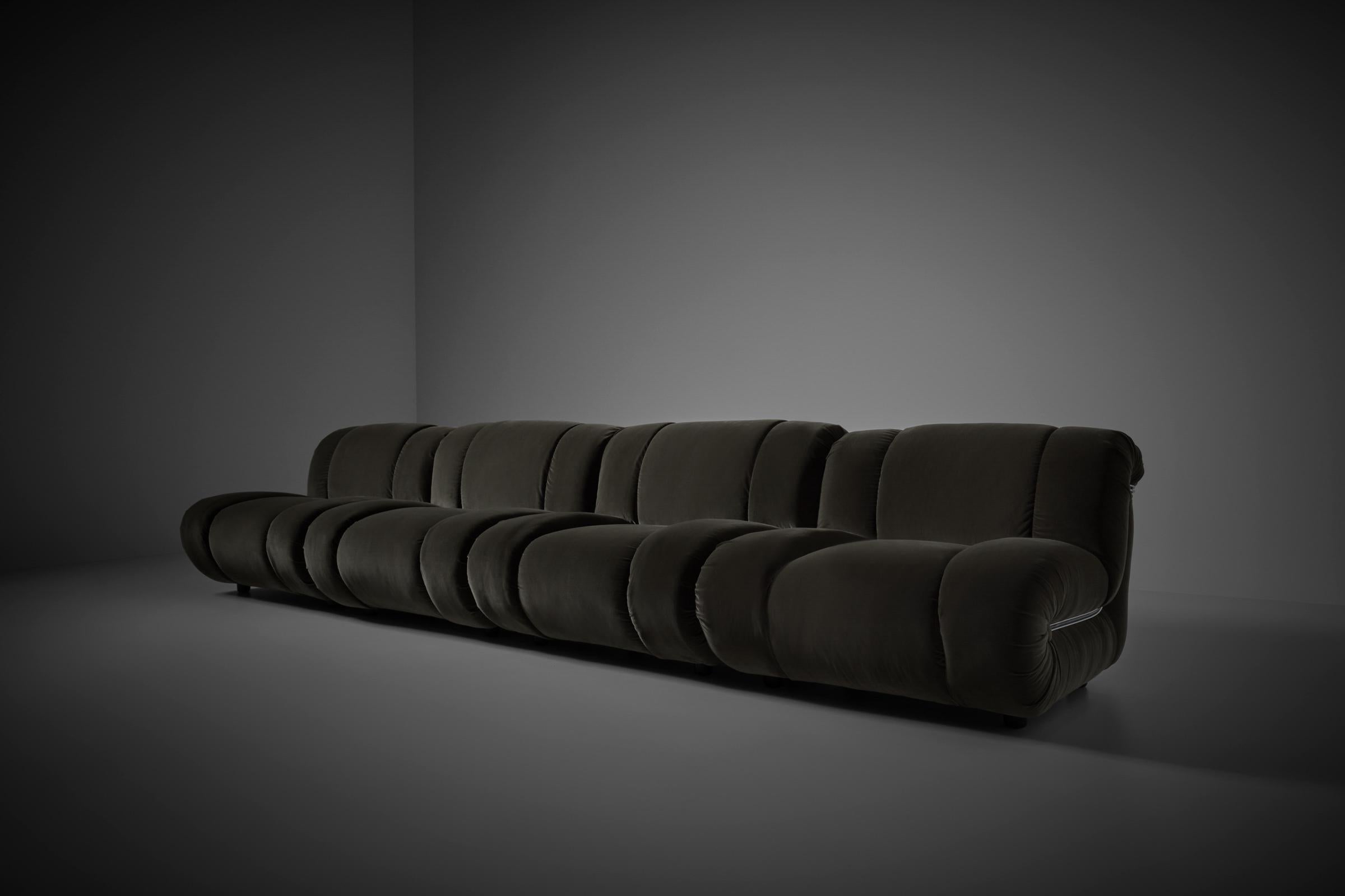 Modular sofa 'Velasquez' by Mimo Padova, Italy 1970s. Very comfortable sofa consisting out of four bulky shaped modular elements molded together by chromed metal clamps. The sofa is reupholstered in a grayish green colored velvet fabric by Dedar ®,
