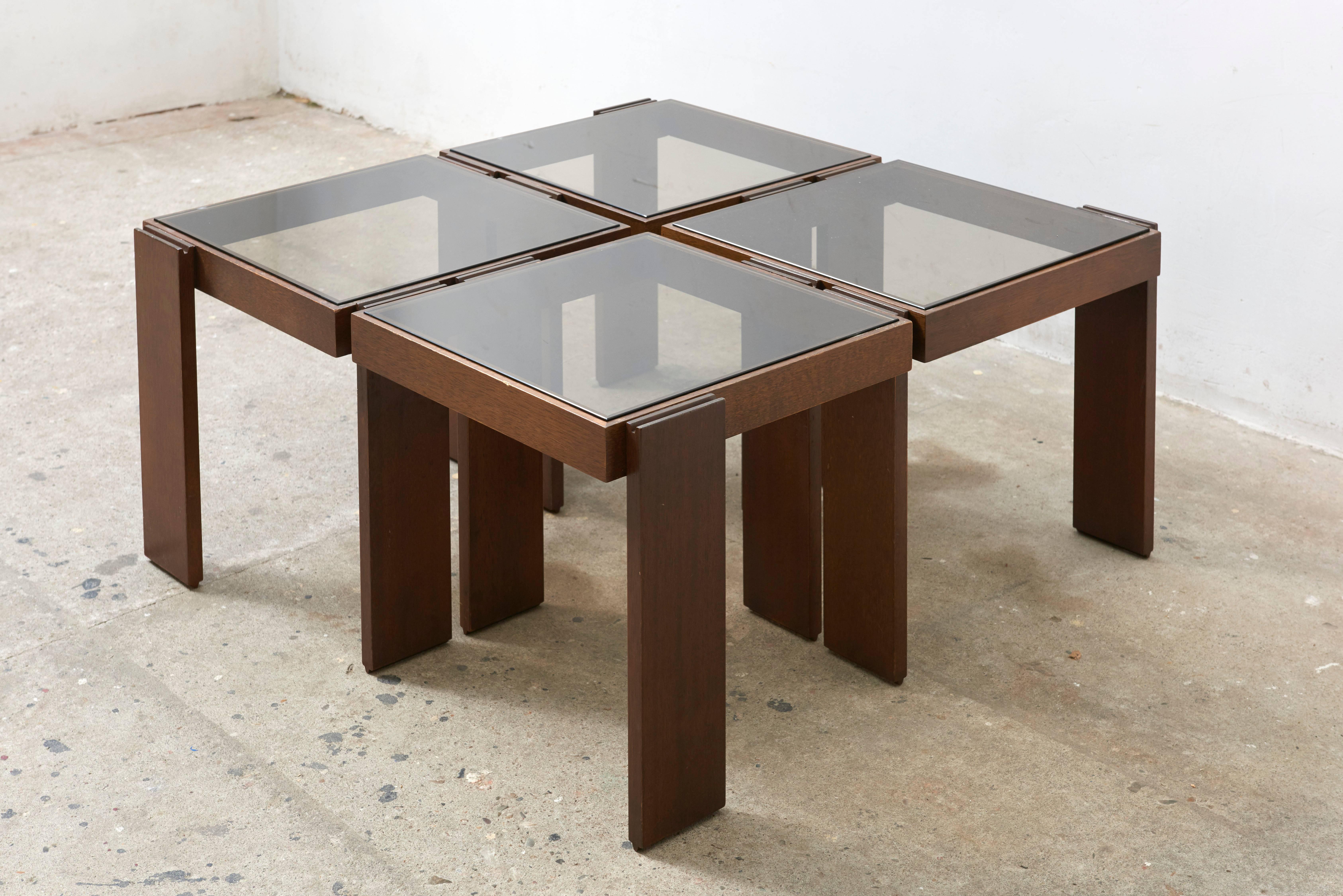 Architectural modular coffee tables executed with four square elements glass top in wooden modular frame.
These coffee tables has many options in your living room such as a central coffee table as a side table next to a sofa or chair or you can all