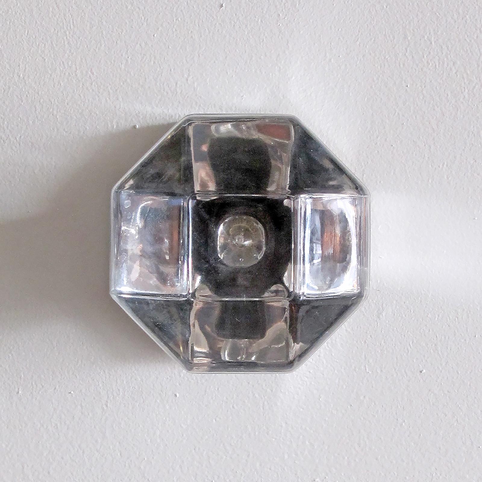 Wonderful chrome and glass wall or ceiling lights by Motoko Ishii for Staff Leuchten, Germany, chrome-plated metal and partially silver plated glass, can be combined into wonderful large groups. Various lights have small cut-outs at the side of the