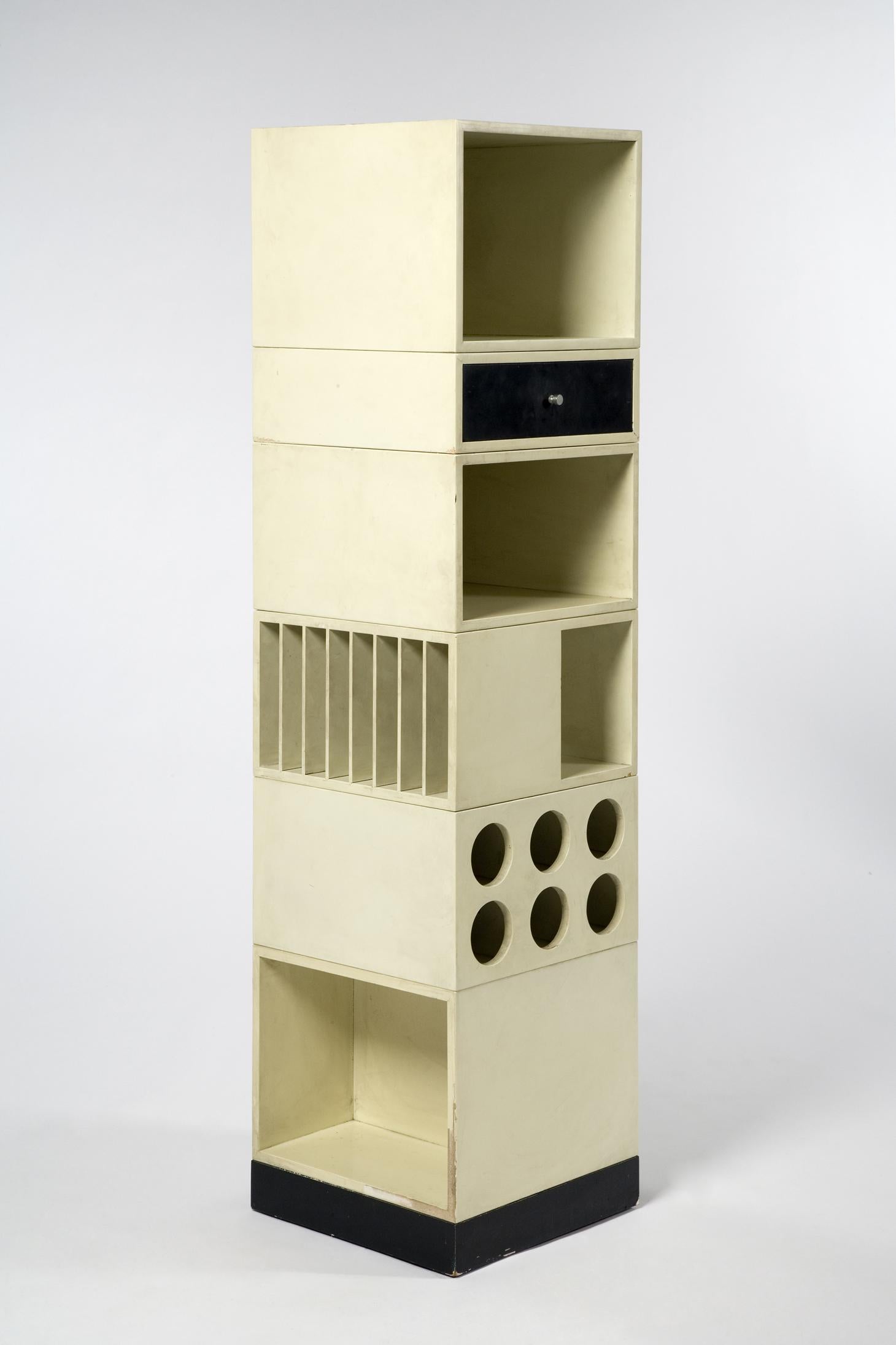 Unusual modular storage cabinet in black and white lacquered wood, Italy, circa 1960.
 
