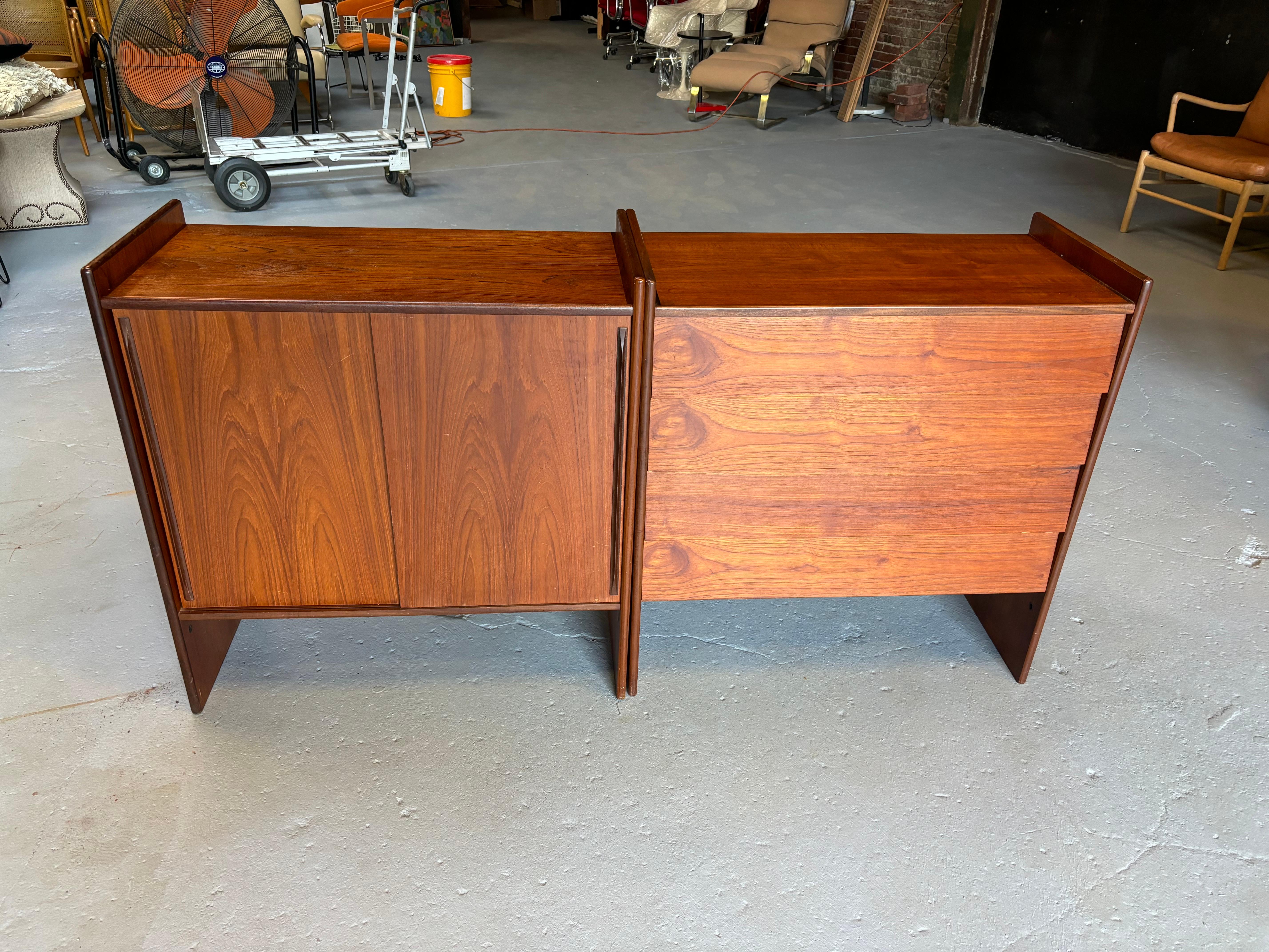 Danish Modern Teak Modular Cabinets.  Finished on all sides, cabinets can be used next to each other or stacked.  Can be used to separate a space or against a wall.  One cabinet has sliding doors and 2 adjustable shelves, the second cabinet is 4