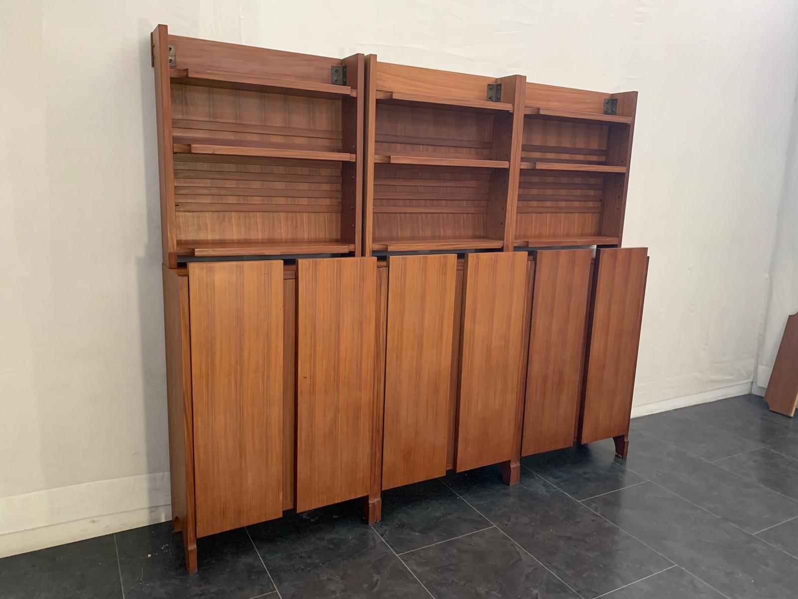 Modular teak sideboard.
Packaging with bubble wrap and cardboard boxes is included. If the wooden packaging is needed (fumigated crates or boxes) for US and International Shipping, it's required a separate cost (will be quoted separately).