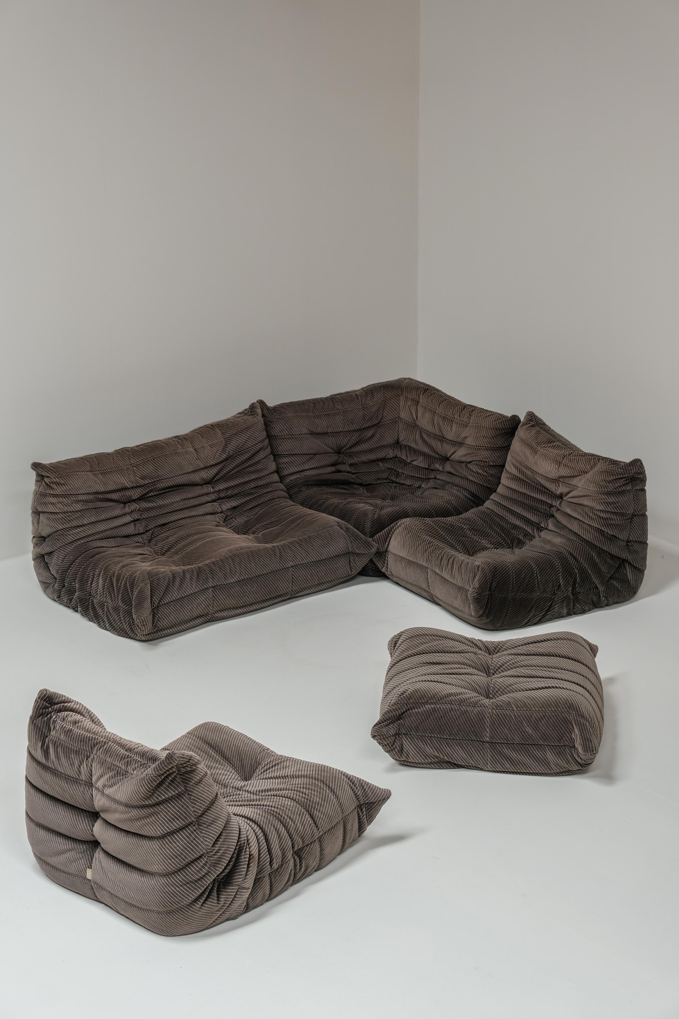 This togo set still has his original fabric and foam in good condition. 
Modular and very easy to move, it counts 2 x Fire chair with one pouf, a two seater and a corner piece. 