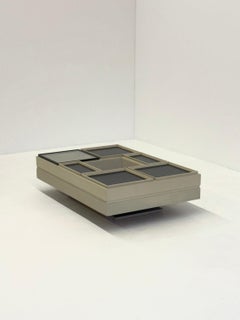 Modular white coffee table designed by Carlo Hauner for Forma