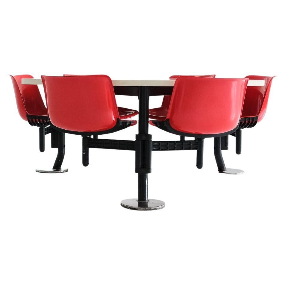 Modus triangular table + integrated swivelling chairs by Osvaldo Borsani, Tecno