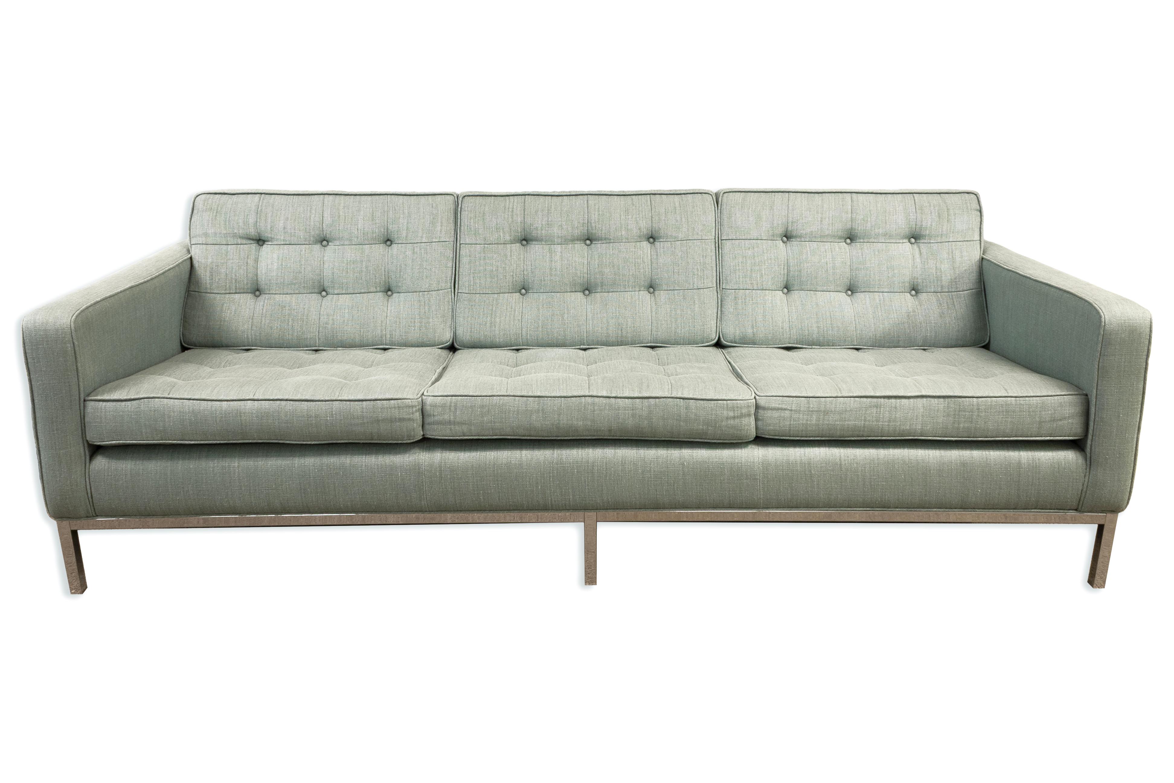 Elevate your living space with the Modway Mid-Century Modern Blue Fabric and Stainless Steel Couch. This sofa features clean lines, a low profile, and classic tufted cushions, embodying the essence of mid-century design. The soft blue upholstery