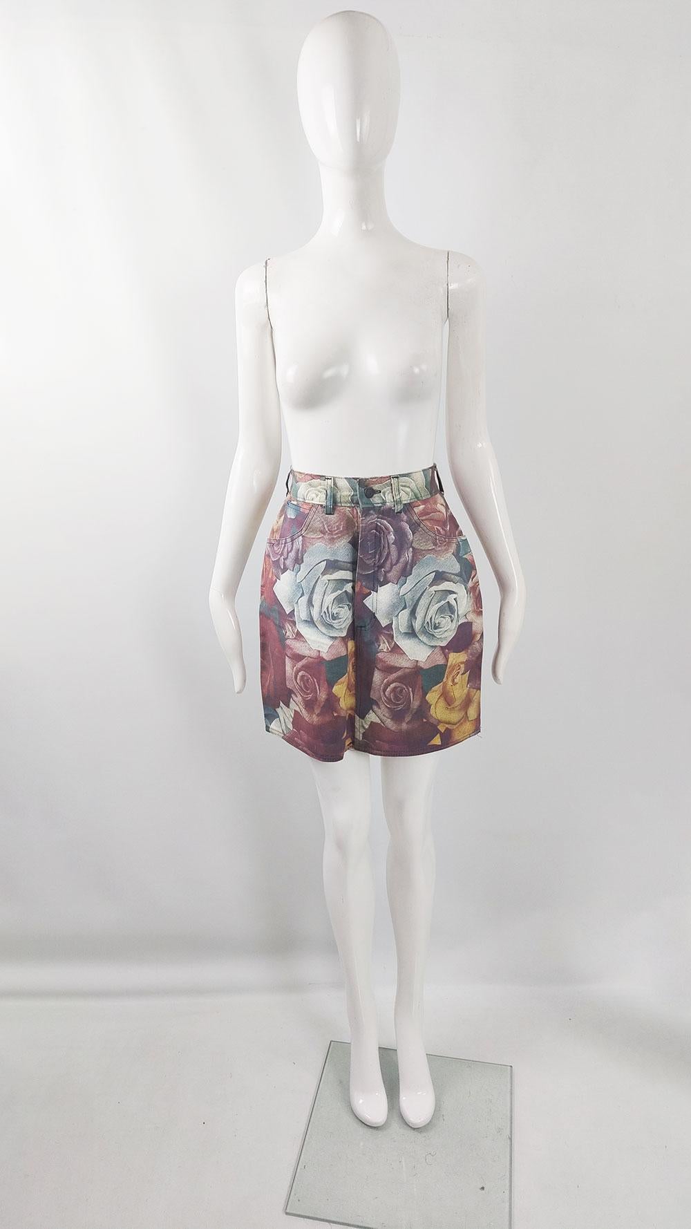A striking late 80s/early 90s vintage women's skirt by the cult British label Modzart, founded by renowned artists John Dove and Molly White. Known for their irreverent punk-inspired works, this skirt showcases a photorealistic rose pattern in