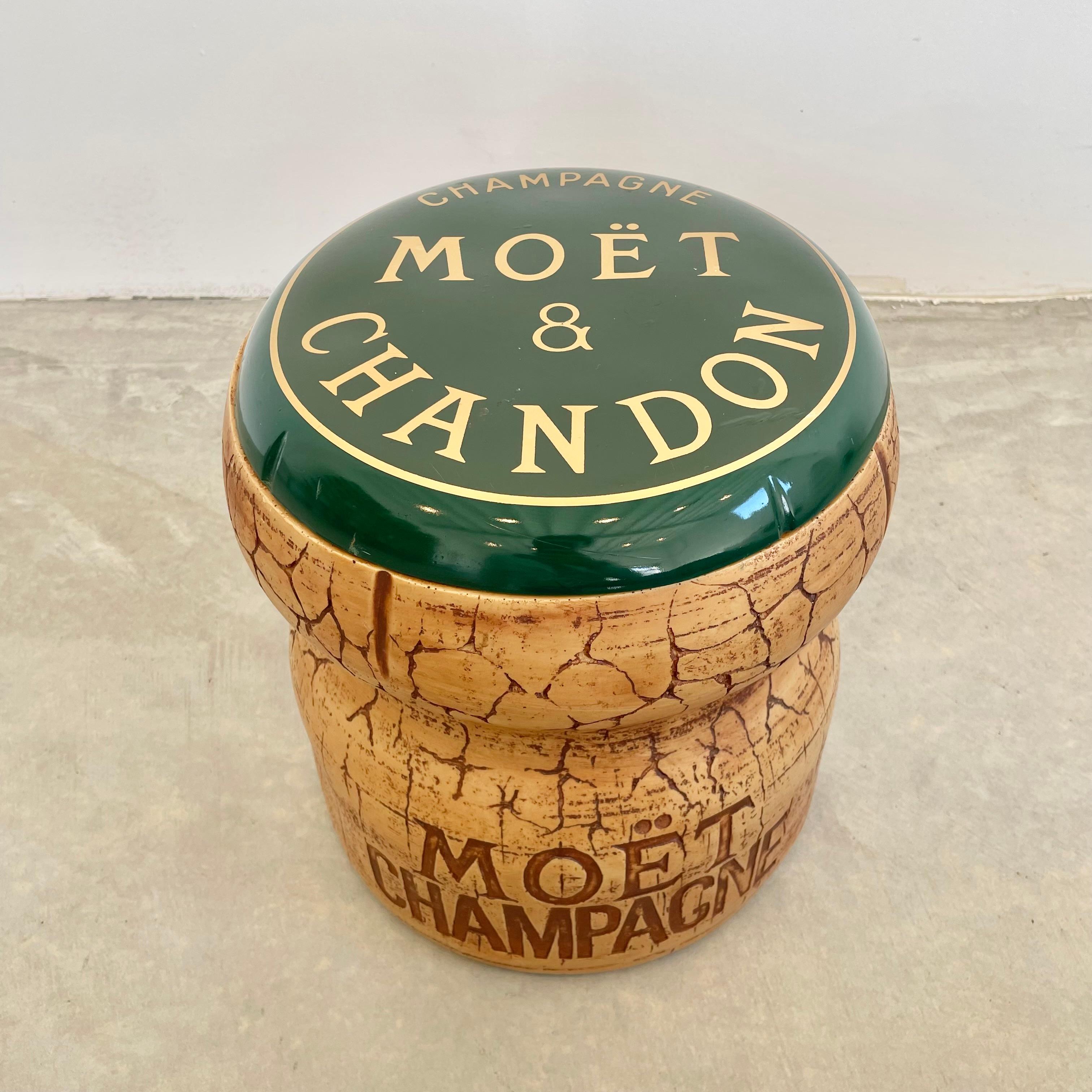 Great pop-art champagne bucket/cooler by Think Big. Made in New York City, 1993 stamped on underside. In the shape of champagne cork by Moet & Chandon. Made of heavy duty plastic and rubber. Inside of cooler has plastic bucket to hold water/ice.
