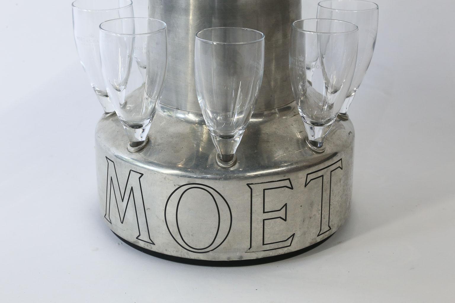 What a find and what a conversation piece! This vintage Moet Chandon champagne cooler with glasses is a stunning item and worthy of a prime location in your home bar. The cooler comes complete with 8 glasses, all embossed with the Moet Chandon logo,
